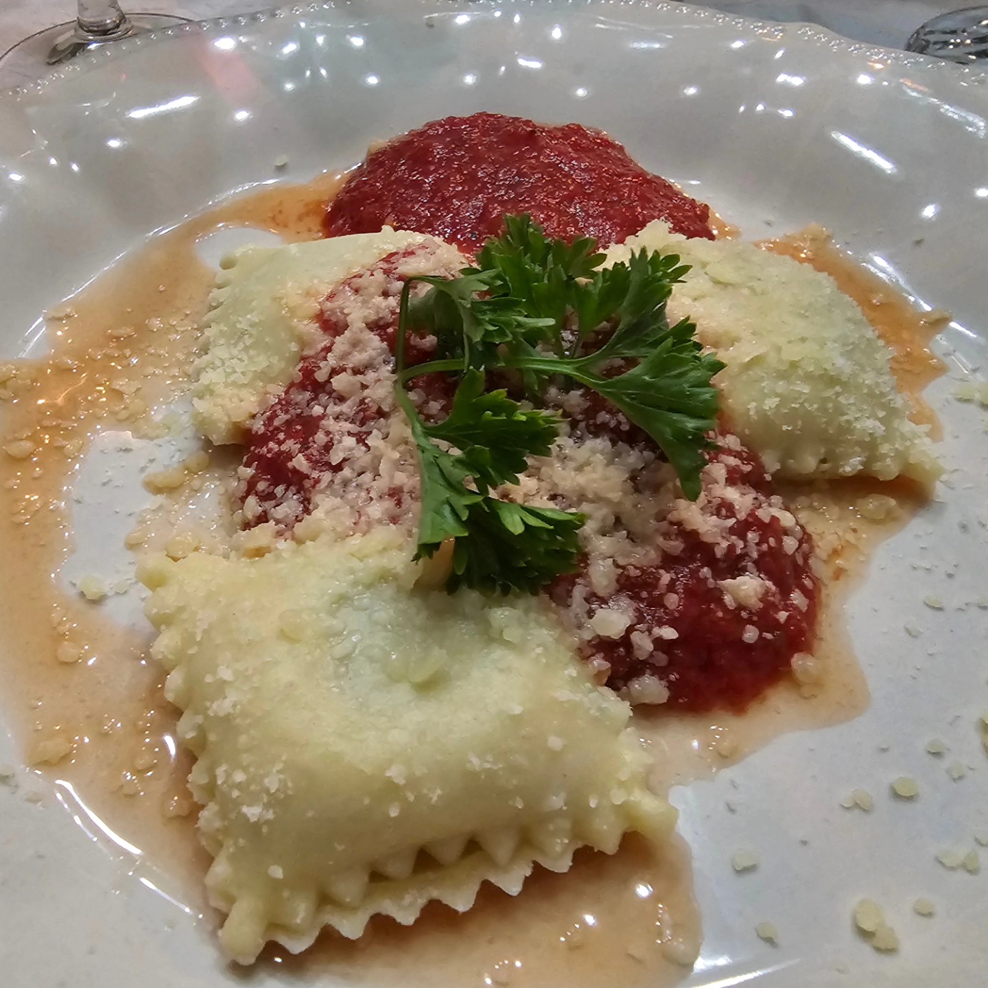 Homemade ravioli with Marcella Hazan's world famous red sauce using fresh tomatoes from Lady Meghan's Garden.
