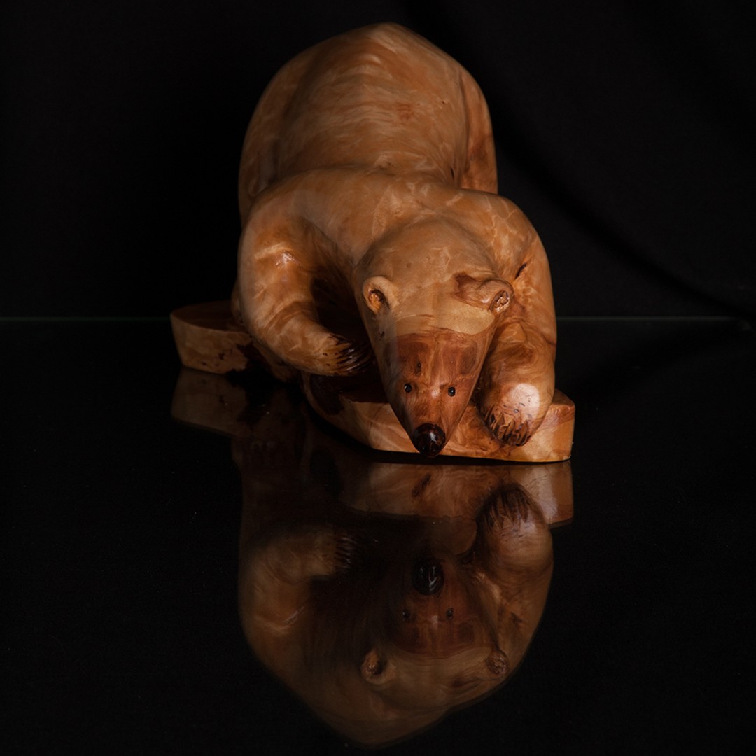 It's International Polar Bear Day. Time to reflect and raise awareness about the conservation status of these amazing creatures. This day coincides with the time period when polar bear mothers and cubs are sleeping in their dens.
Carving commission by Jesse Toso 2013.