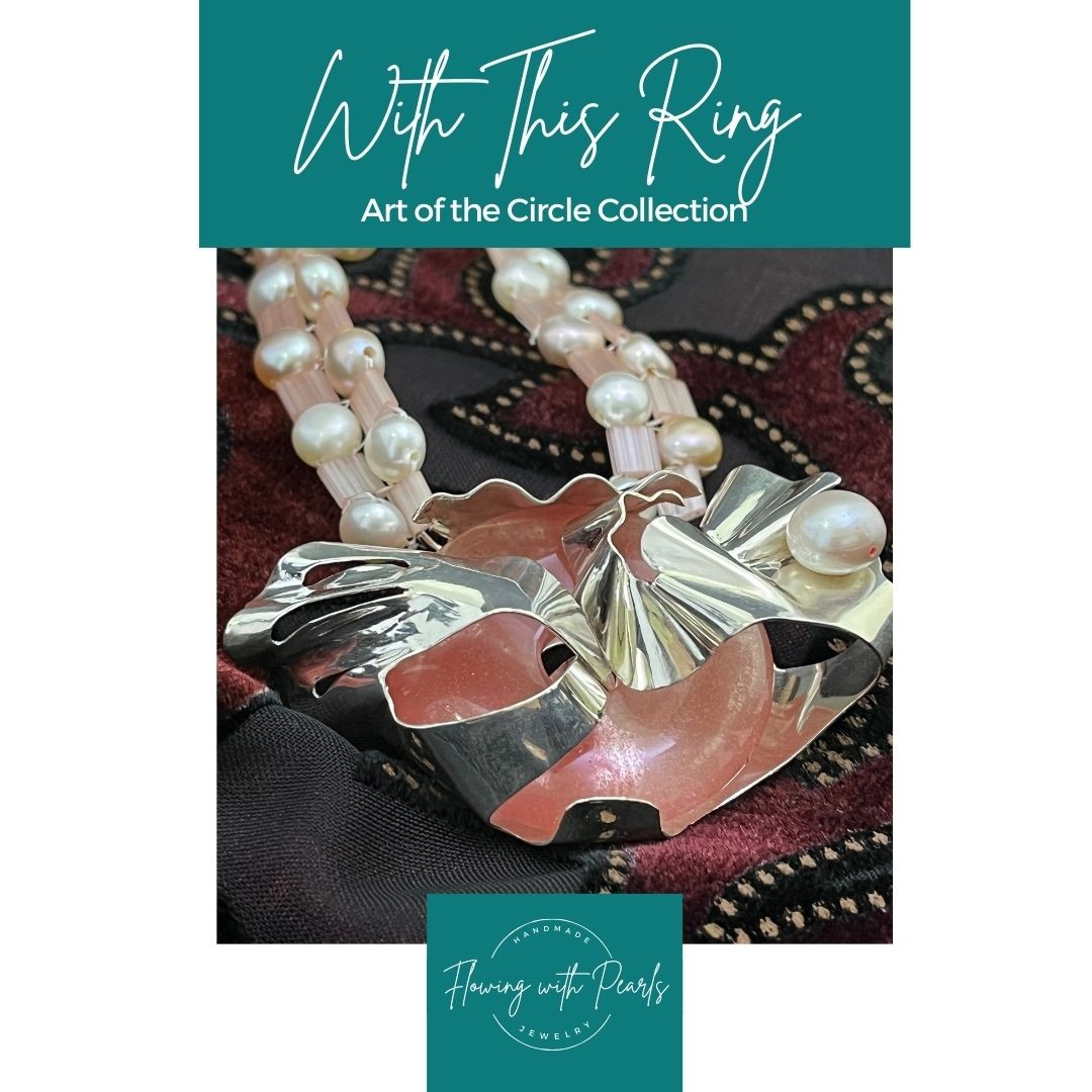 Capturing elegance and emotion in every detail. Introducing 'With This Ring' pendant from my Art of the Circle Collection – a harmonious blend of Silver, pearls, Tila Glass, and Rose Quartz. Proudly showcased at the Artistic License III show by the Museum of Contemporary Art of the Americas. Elevate your style with this unique piece, now available for purchase.