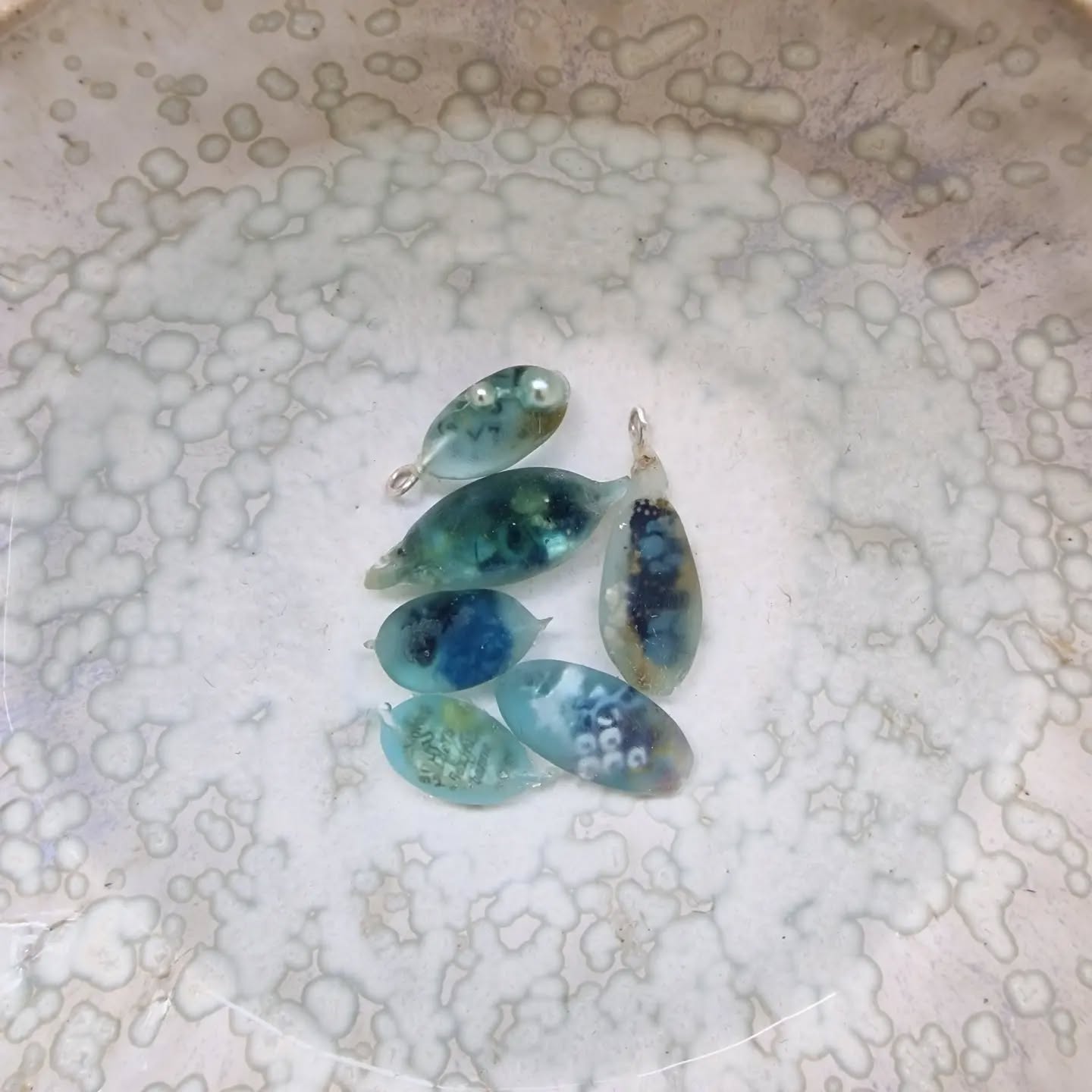I cast more Bio Resin pieces over in France last week- it needs to be HOT for the resin I use to work best as its a little temperamental. And I only like casting outdoors now ( -again- its how I started casting too). Sanding them in water with wet and dry paper- which I secretly love doing (now that I don't do it so much). More of the little collaged necklaces coming soon for those who have requested them
#castingresin #collage #layers #Cornwall #bioresin #sustainablejewellery #handmade #jewellerydesigner #madebyhand #bioresinnecklaces #jewelleryicanswimin