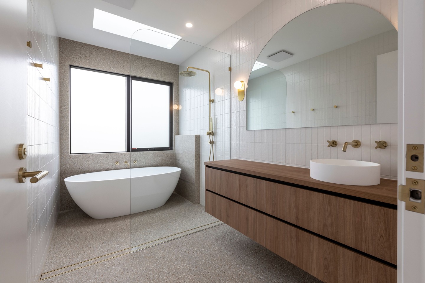 BATHROOM BLISS . MODERN COASTAL STYLE 🛁
Stepping into this space feels like a breath of fresh air! Every element was chosen to create a retreat that’s both functional and beautiful.
• Terrazzo tiles for subtle texture and visual depth
• Gold fixtures adding a touch of luxury
• Natural light pouring in for that perfect morning start
• Warm timber vanity + arched mirror = timeless elegance
We love designing bathrooms that are as relaxing as they are practical. Can you imagine unwinding here at the end of the day? 😍
Stay tuned for more 3D peeks and design stories from our latest projects!
Built: @supreme_building_group
#RLDDesign #GeelongInteriors #BathroomDesign #TerrazzoLove #ModernCoastal #AussieHomes #HomeSanctuary #DesignDetails #SurfCoastLiving #DreamHomeDesign #RenovationInspiration #GeelongSmallBusiness