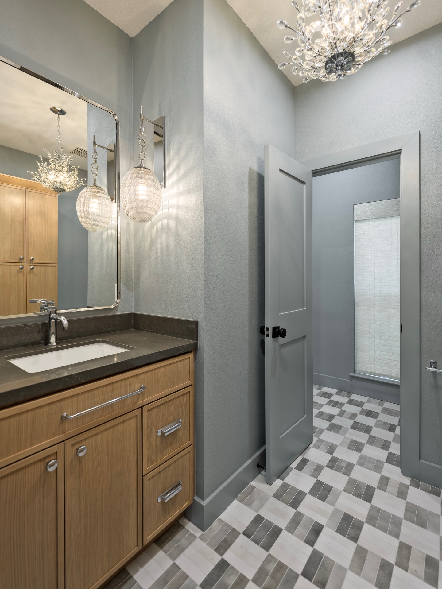 Okay but why does this guest bath have more personality than most primary baths?? The checkerboard floors, the funky light fixtures, that lovely wall color… and yes, there’s a SAUNA. No big deal… just a full-on spa moment for visitors😅💅
•
•
•
🛠️ Awesome construction by @andersonfamilybuilders
📸 Lovely photos by our friends @bayou.city.captured