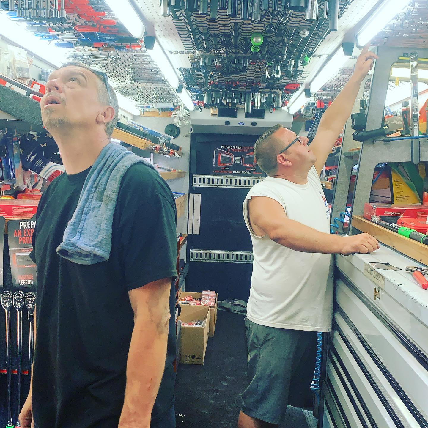 Grown men in a mobile toy store #snapontools