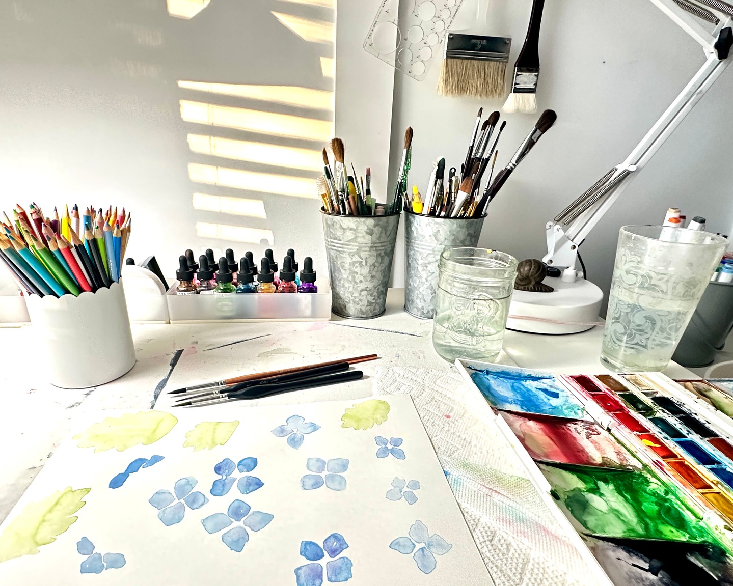 From a loose watercolor study to a repeat-ready pattern file, we guide each design through thoughtful stages so retailers and makers know exactly what they’re licensing. I begin with a hand-painted motif, refine color and scale, and digitize for flawless repeats that work across tea towels, pillows, and home goods. Every pattern reflects vintage-inspired charm, careful craftsmanship, and responsible production choices—so your shop or project feels curated and lasting. Love a sample? Tell us which motif you'd like to see on fabric! Link in bio 🌿🎨🧵✨ #ModernCottage #HandmadeHome #PatternDesign #LissyPayneDesigns #Hydrangeas #watercolorbotanicals