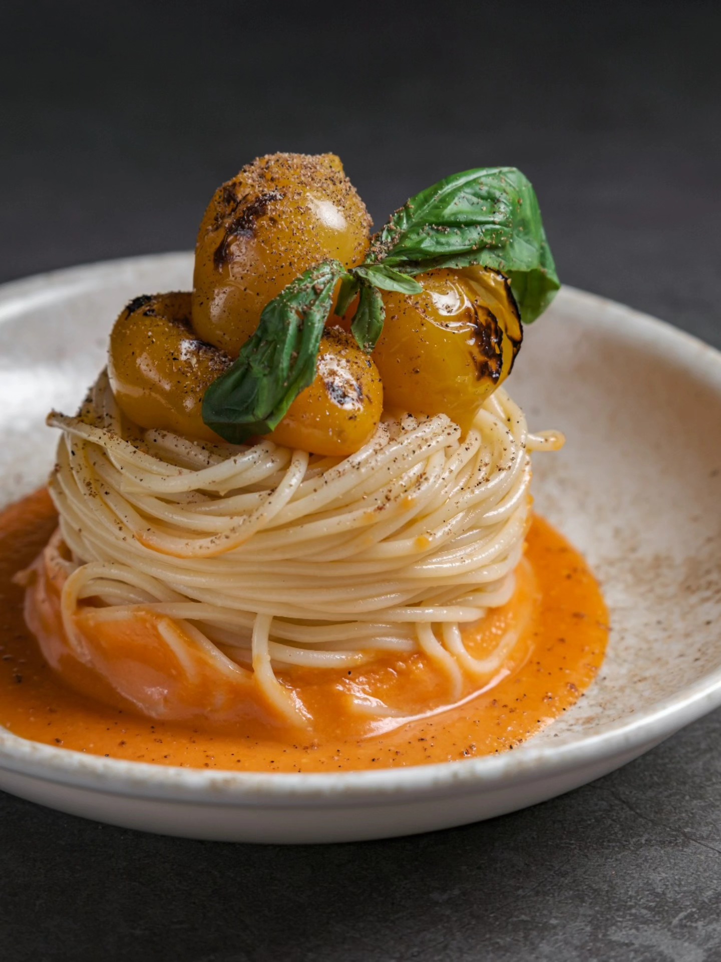 New on the Menu: Spaghetti, Datterini Tomatoes, Basil
Al dente spaghetti expertly twirled into a dainty nest, gently resting on a rich sauce made with Italy's finest datterini tomatoes, renowned for their exceptional sweetness. Il tocco finale? A delicate crown of glistening datterini tomato and fragrant basil, adding a touch of elegance to this Italian masterpiece.
Exclusive to Griglia at Katong, savour this simple yet incredibly satisfying dish at $22.
Griglia Open Fire Italian Kitchen
(Singapore Tatler Best 2025 Recommended Restaurant)
📍Katong | 139 East Coast Road
📍Tanjong Pagar | 37 Craig Road
