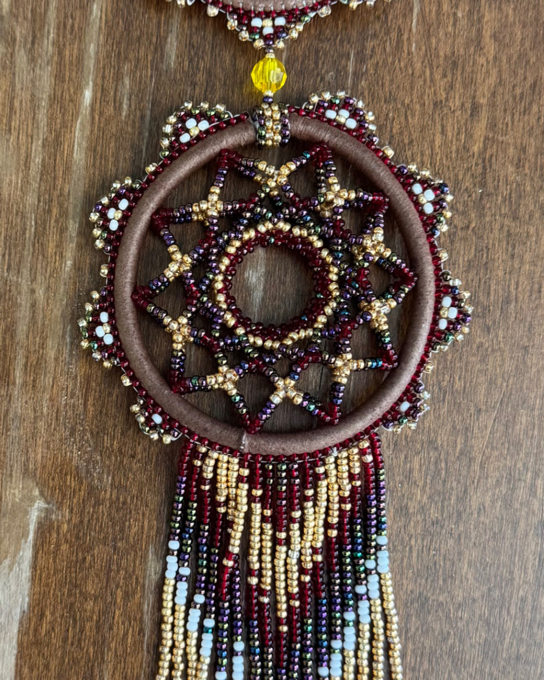 ✨ Add a touch of tranquility to your home with our Earth Colors Double Beaded Dreamcatcher! Each piece is carefully handcrafted by local artisans, embodying the essence of Indigenous culture. Available now! Link in Bio #Dreamcatcher #HomeDecor #IndigenousArt