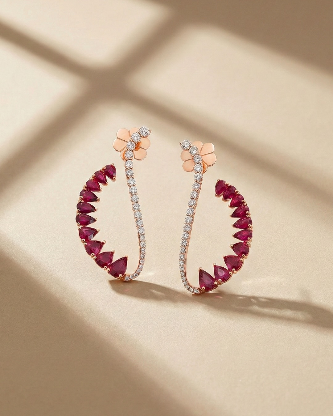 Visual rhythm in ruby and light. A structured drift along the jawline.
#DilaExclusive #ModernistJewelry #StructuralDesign #EarSculpture #ContemporaryGems