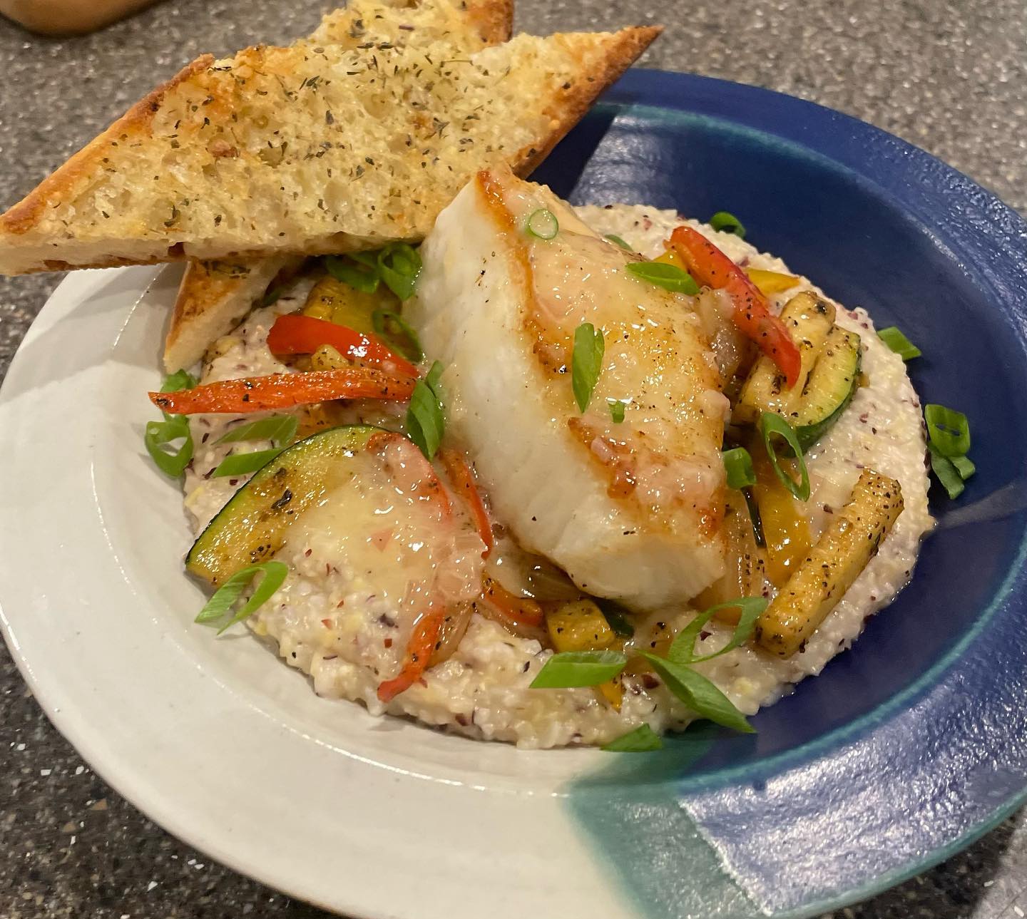 Valentine’s dinner for the girls last night. Pan seared Chilean bass from @saltwater_markets with beurre blanc sauce over sautéed veggies and white cheddar Jimmy Red grits