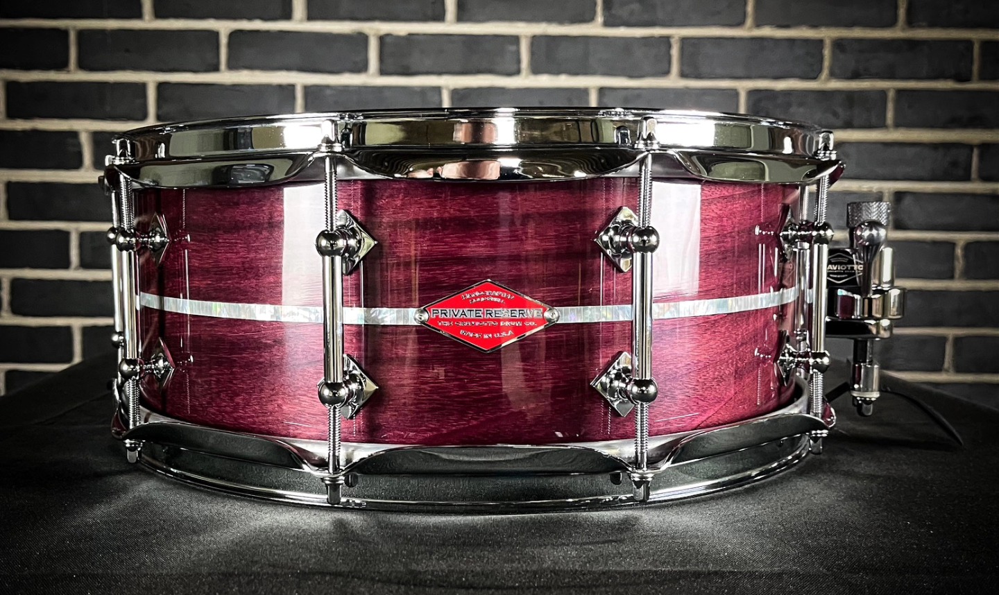 This ultra rare Craviotto 5.5x14 Private Reserve snare is shaped from Purple Heart wood with real White Marine Pearl Abalone inlay and 45/45 edges. Only a handful of Purple Heart snares will be made by the master craftsmen at @craviottodrumco. Grab this now! Contact Steve Sr at 630-865-6849 for pricing and to reserve this drum.