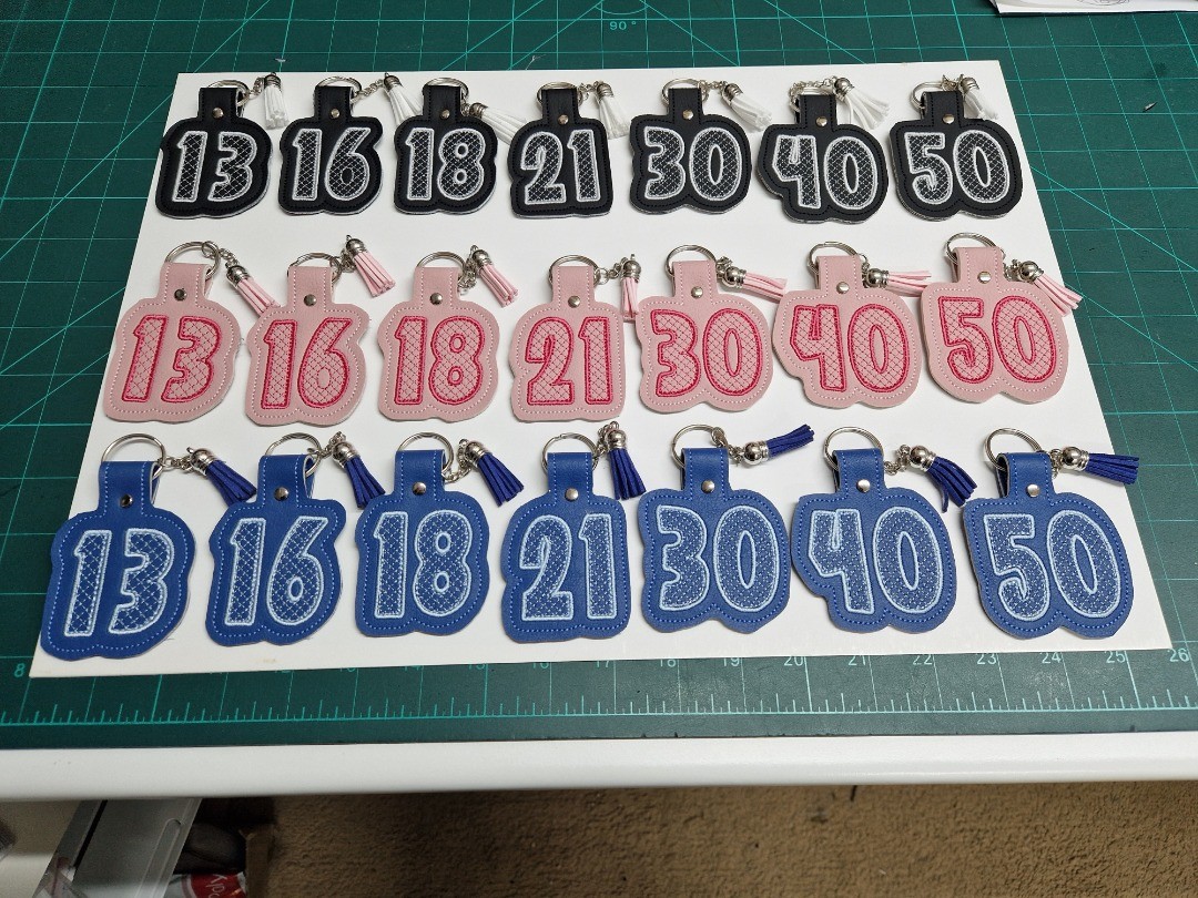 New number keyrings, buy as a gift for a friend or relative, all ages available in a variety of colours inlcuding those shown above