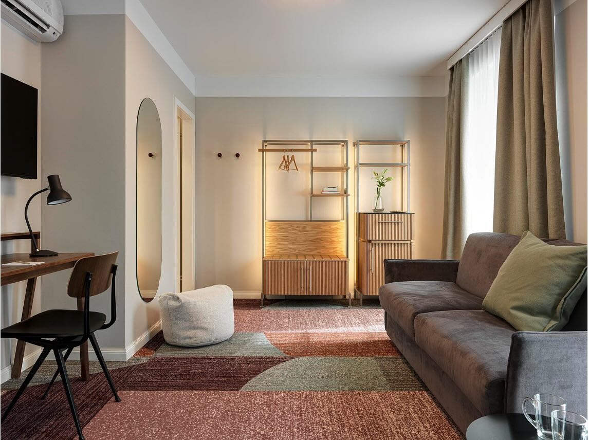 Hotel St. Josef
The renovation of Hotel St. Josef in Zurich beautifully intertwines modern design with deep symbolic and cultural elements. The new design concept celebrates the spirit of Zurich’s Niederdorf district while incorporating the story of St. Joseph, creating a unique atmosphere that combines history, craftsmanship, and modern comfort.
Key Design Features:
1. Warm and Inviting Atmosphere:
• Light parquet flooring adds warmth and a natural aesthetic.
• Delicate oak furniture reflects both quality and craftsmanship, symbolizing St. Joseph’s carpentry heritage.
• Elegant pastel colors enhance the lightness and purity of the rooms, subtly nodding to the white lily, a symbol of faith and chastity.
2. Craftsmanship and Customization:
• Custom-made furniture highlights the artisanal approach and celebrates the art of woodworking, staying true to the legacy of St. Joseph as a craftsman.
• Thoughtfully chosen materials emphasize quality and durability, blending tradition with a contemporary feel.
3. Symbolic Elements:
• The square measure, representing precision and skill, is subtly incorporated into design patterns or motifs.
• The white lily inspires the color palette, bringing freshness and serenity to the space.
I worked on this project as a team member in the interior architecture department of the architecture and design studio IDA14 in Zurich where i was given the opportunity to support the overall concept of the hotel rooms as well as the design of the bathrooms
Design Studio: @ida14_by_karsten_schmidt
Photography by: @bruno_helbling_fotografie
#interiordesign #hoteldesign #interiors #design #zürichcity #zurich #hotelstjosef #craftsmanship #whitelily #aesthetic #moderndesign #oak #pastelcolors #quality #tradition #contemporary