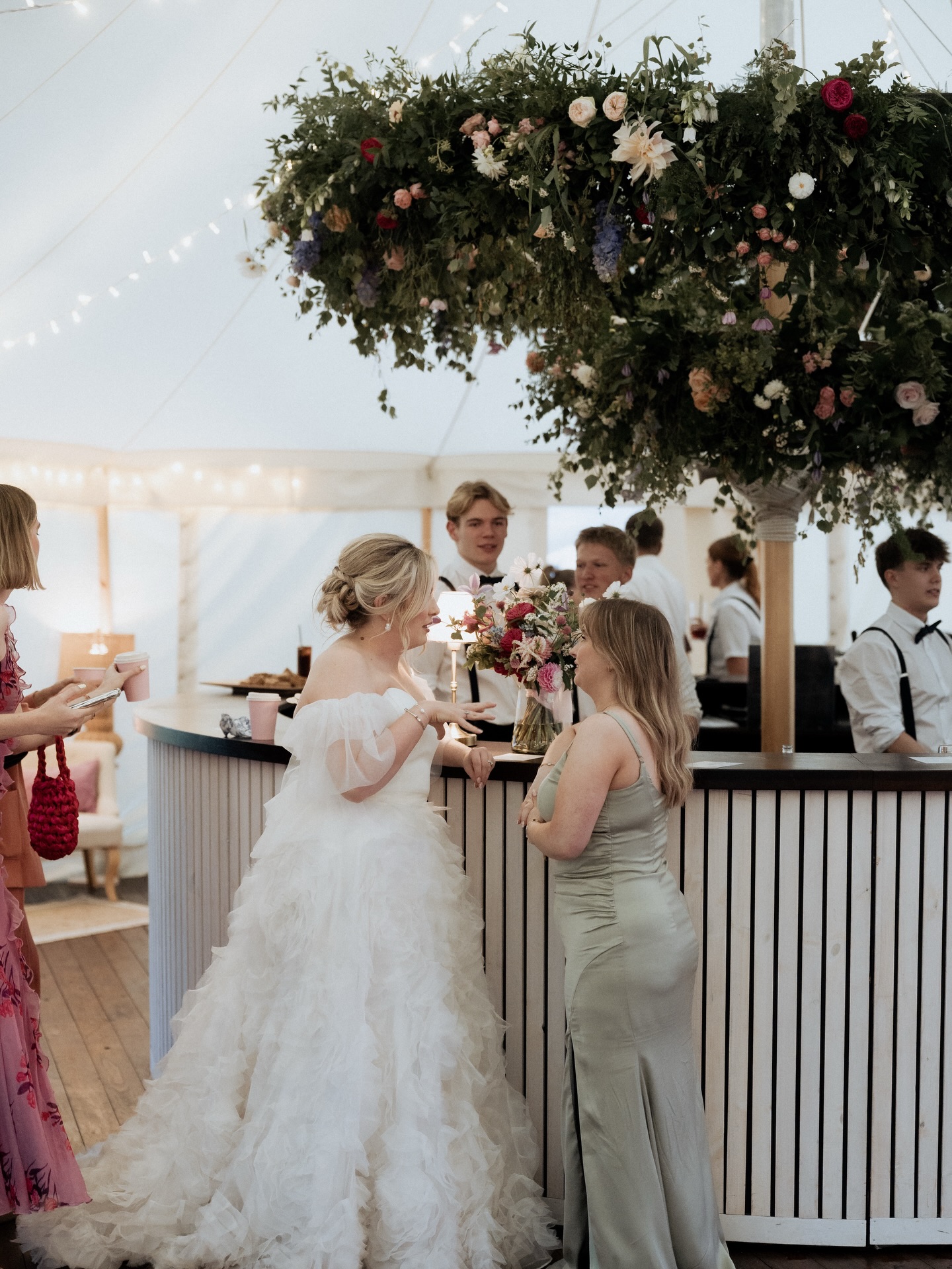 Double the charm, double the wow! Our stacked flower rings are the ultimate statement above a round bar, perfectly whimsical with every bloom.
Designed with a clever pulley system, making it easy for your florist to create a show-stopping display, whether the larger ring sits on top or below, the impact is guaranteed!
Photographer - @tomwyatt.co
Florist - @a_bunchofblooms
Wedding Dress - @morgan_davies_bridal / @halfpennylondon
Bridesmaid Dress - @sixstories
Venue - @stauntonharoldweddings
#greenfarmmarquees #weddingflorals