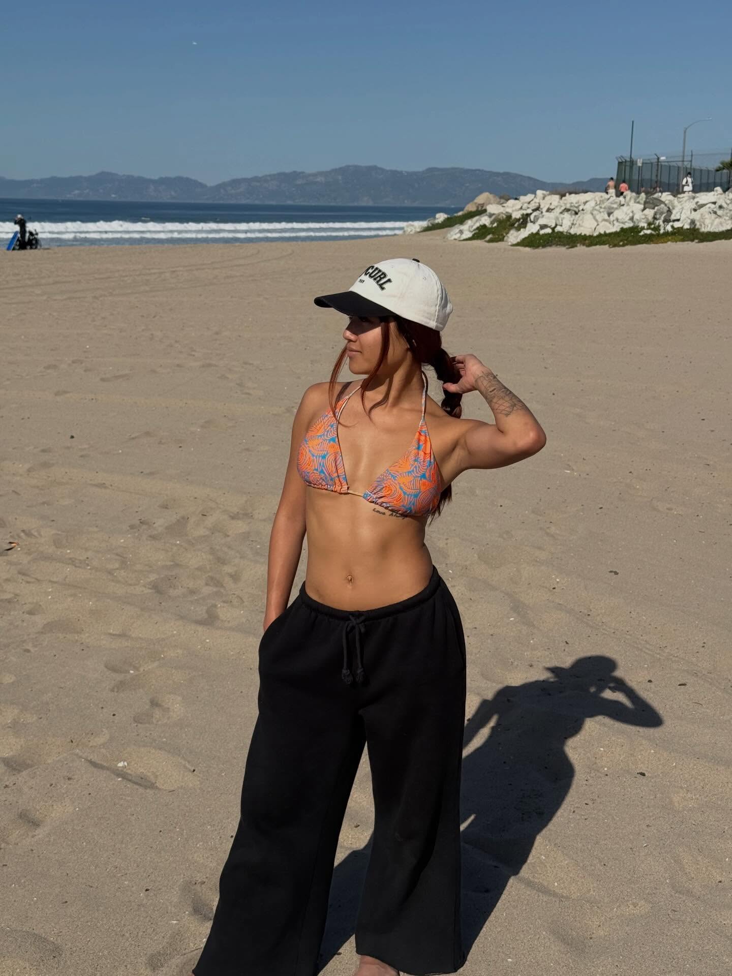 Spotted @withlove.bella in our El Porto top🧡