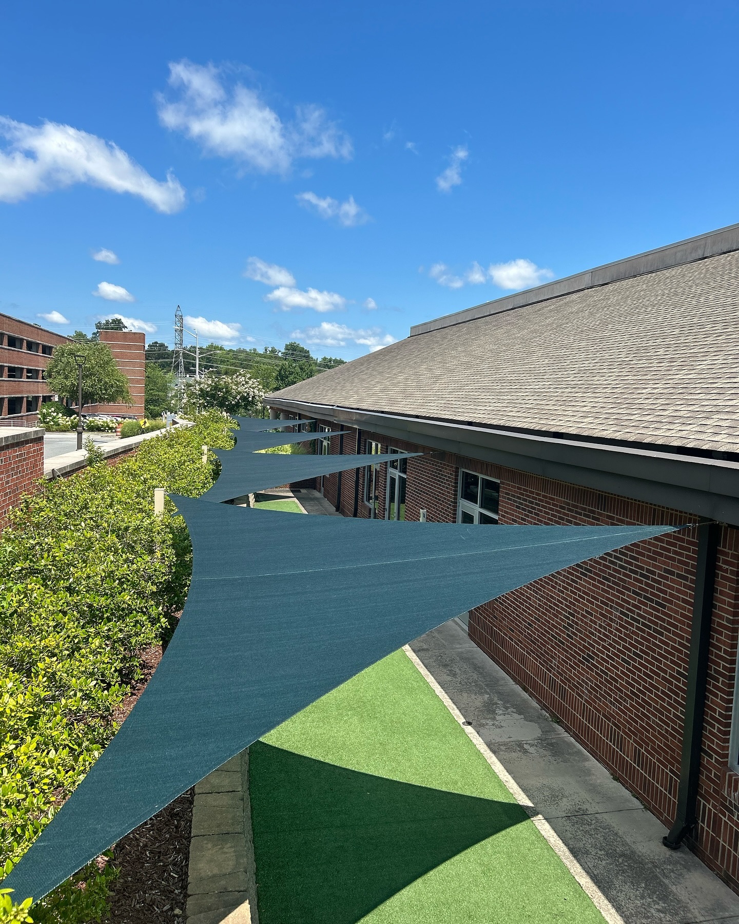 New project completed‼️ 4 triangle shade sails for a shady play spot at a daycare☀️