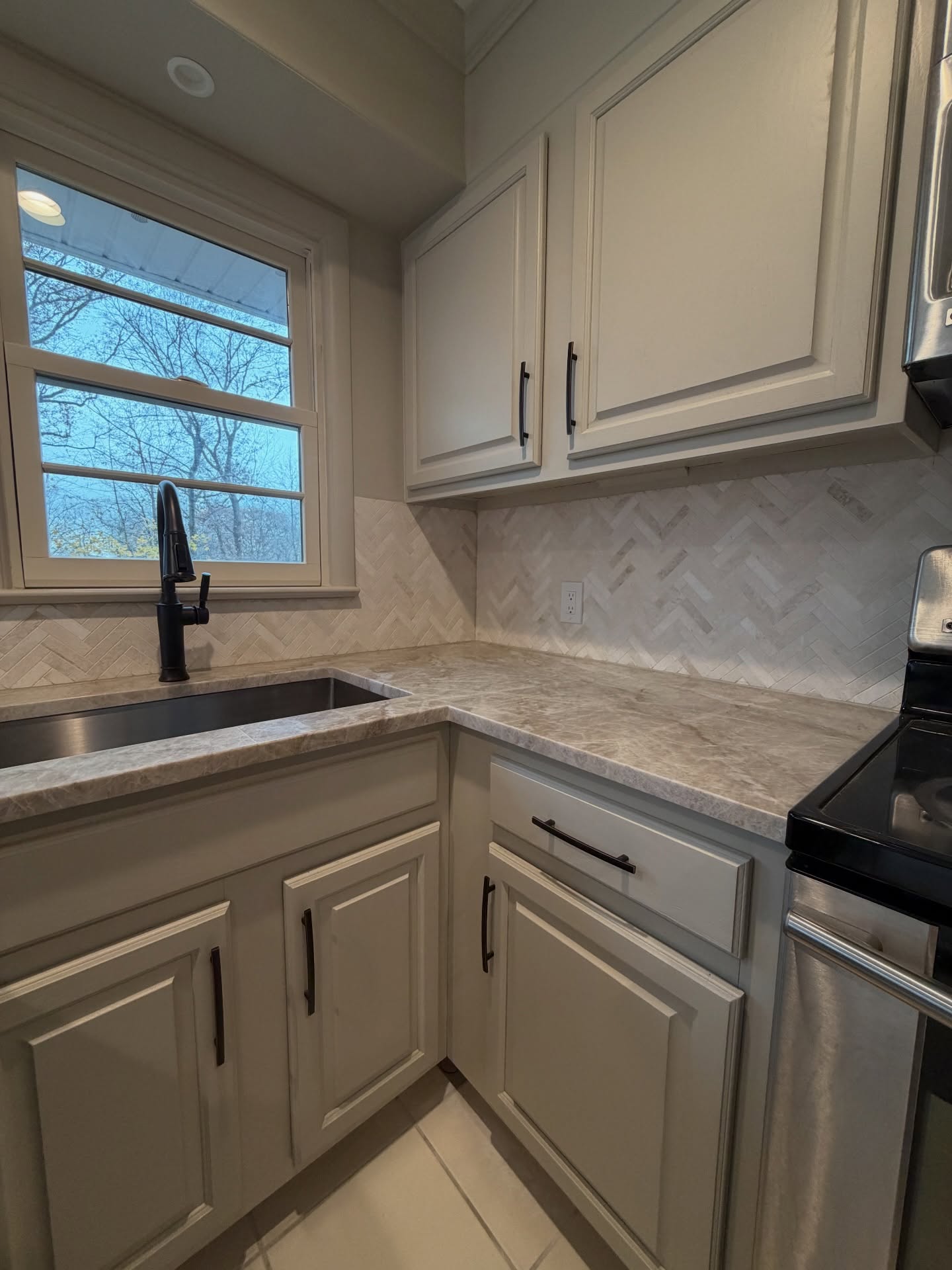 Check out how this kitchen looked before! 👀Transformations don't always require demolition!
This kitchen was part of a total home renovation that consisted of renovating 3 bathrooms, reconfiguring the primary bedroom for a larger bathroom and closet, installing new vinyl luxury flooring in the basement, removing old panel walls, installing built-in and new bar cabinetry, new electrical, paint throughout, resurfacing 2 fireplaces and refinishing the hardwood floors!
So when it came to the kitchen, we made some decisions to keep the kitchen cabinetry since they felt it was still in great condition and happy with the way it functioned. We decided to save some money and paint the existing cabinetry, install new Taj Mahal quartzite counters from @jfgraniteandmarble, install new stone herringbone backsplash from @thetileshop, install a new sink, faucet and cabinet hardware and this kitchen looks brand new!
It wasn't their first option, but the other rooms were in more need of completely gutting and rebuilding than the kitchen. And sometimes in renovations you need to make those decisions. And it's our job to make sure it's beautiful! 203-778-9385
#kitchenremodelingideas #kitchendesignideas #paintedcabinetsbeforeandafter #homeimprovementprojects #ctcontractor