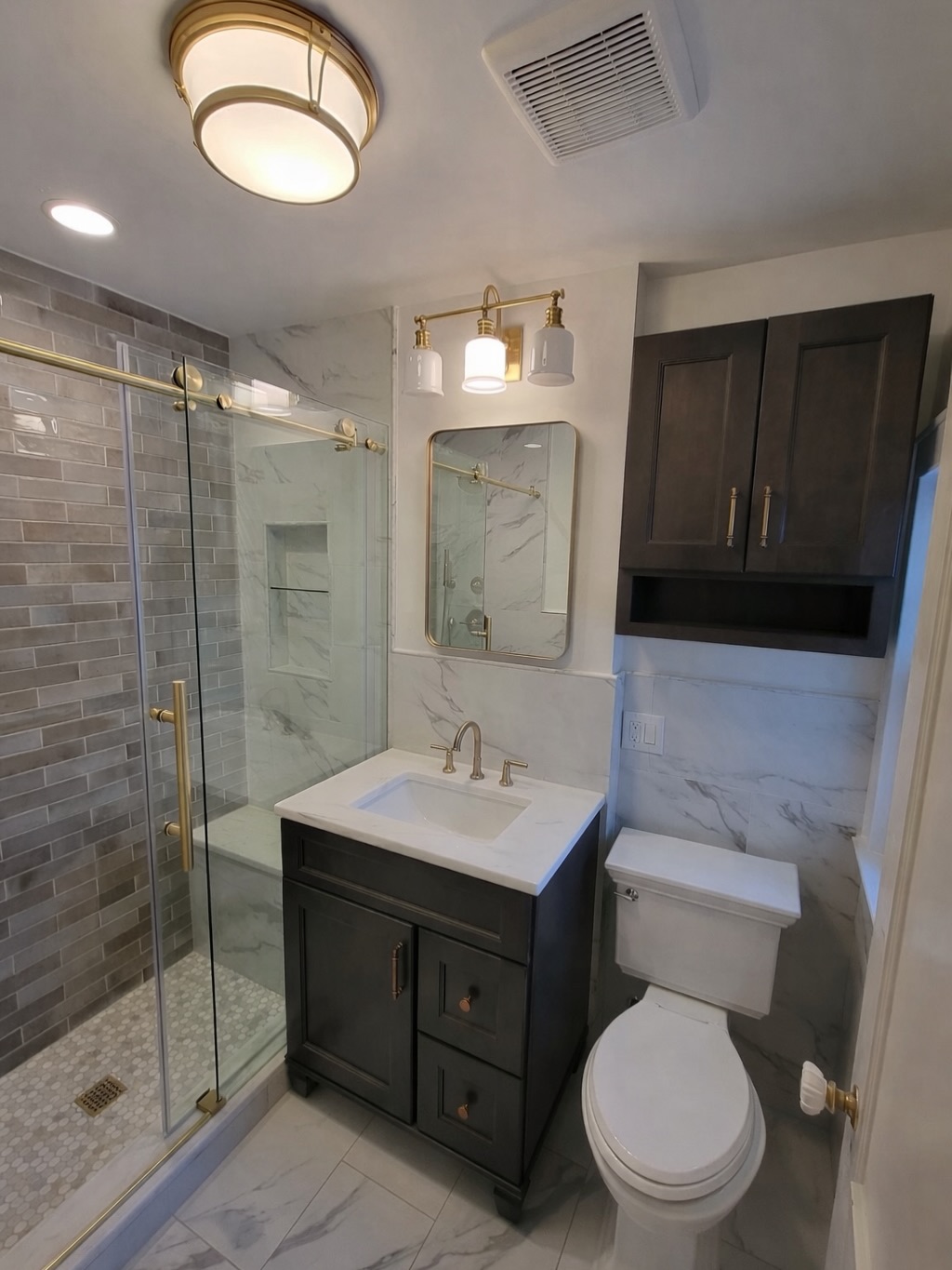 Let's congratulate Simone on the completion of her first project with Solimine Contracting! Her and Jonna make the perfect team when helping clients. And this is bathroom 1 of 2 that we are renovating for these clients. So stay tuned for Simone's design on bathroom 2!
Beautiful Spaces don't always come in big packages. And this bathroom IS BEAUTIFUL!!
We can't figure out what our favorite part of the bathroom is because we love it all! What's your favorite part? 203-778-9385
#bathroomgoals #bathroomdesignideas #bathroominspiration #bathroomrenovation #homeimprovementprojects