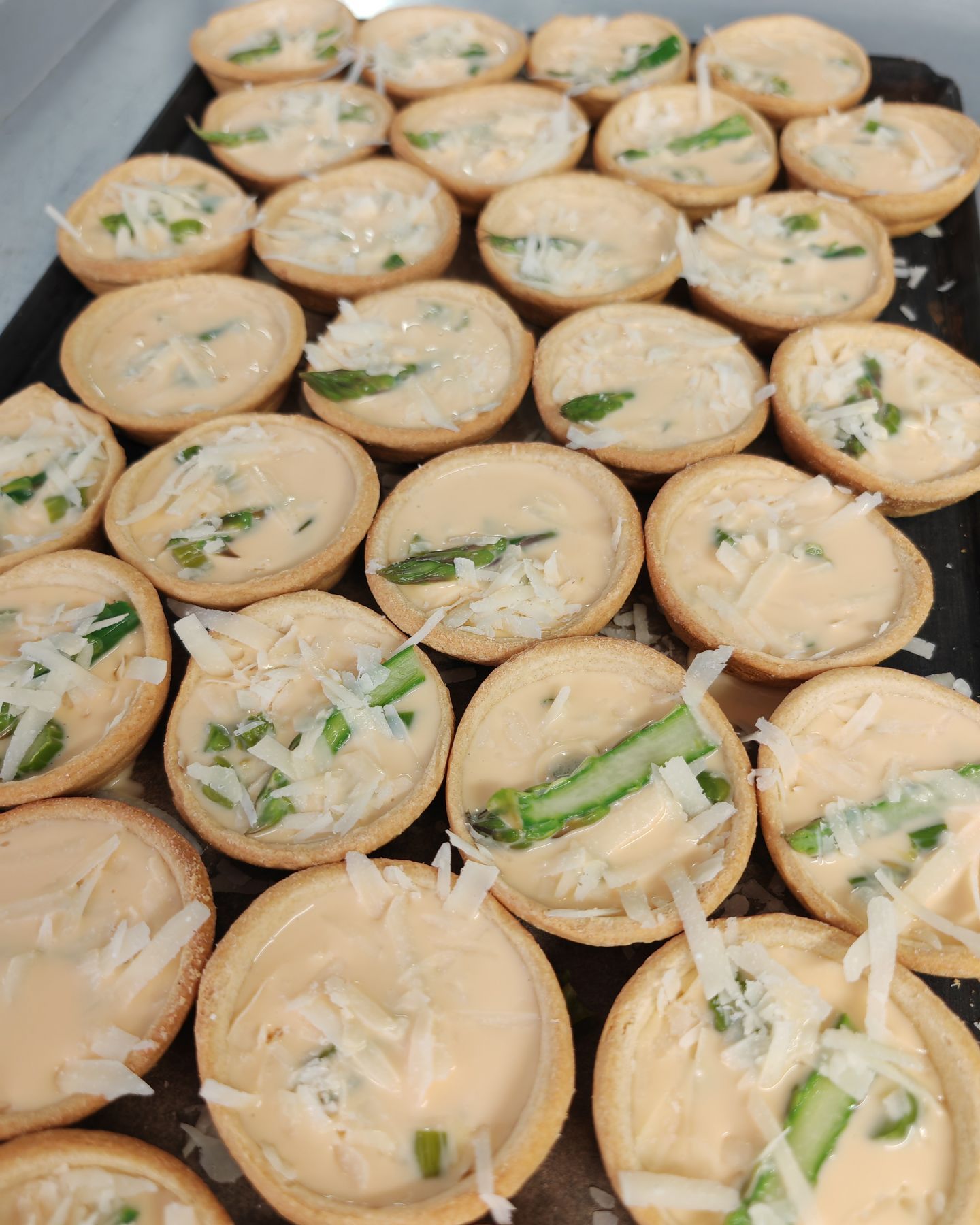 Giving English asparagus a proper send off in June, mini asparagus tarts, all ready for the oven. #yorkcaterer #eatlocal #eatYorkshire #food #delicious #tooshort
