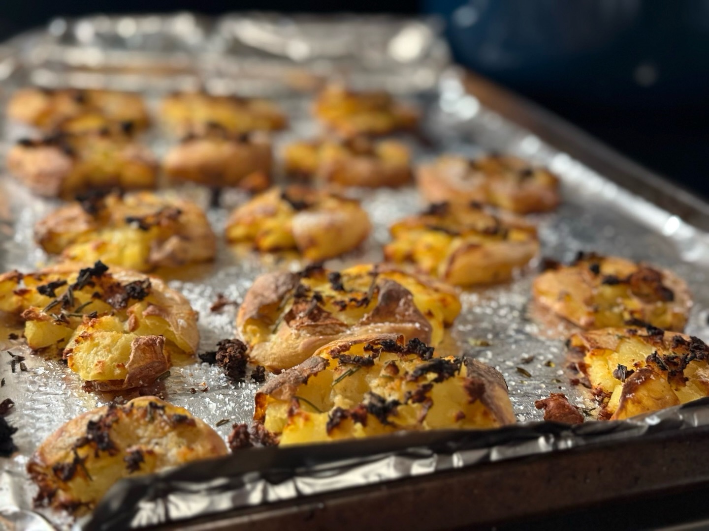 Our friend Phil whipped up these crispy garlic smashed potatoes. Here’s how he did it, so you can too:
Boil small potatoes until tender.
Remove, strain and let dry slightly.
Place on oiled baking sheet and smash - the thinner they are, the crispier they will be. Target 1/4” up to 1/2”.
Drizzle with olive oil
Place butter on top.
Salt generously.
Apply Garliki ✨liberally✨ (Phil used Herbe, but any @garlikipaste flavor will work)
Any preferred herbs like chives, rosemary or thyme.
Bake at 425 until golden brown and crispy, about 30-40 min.