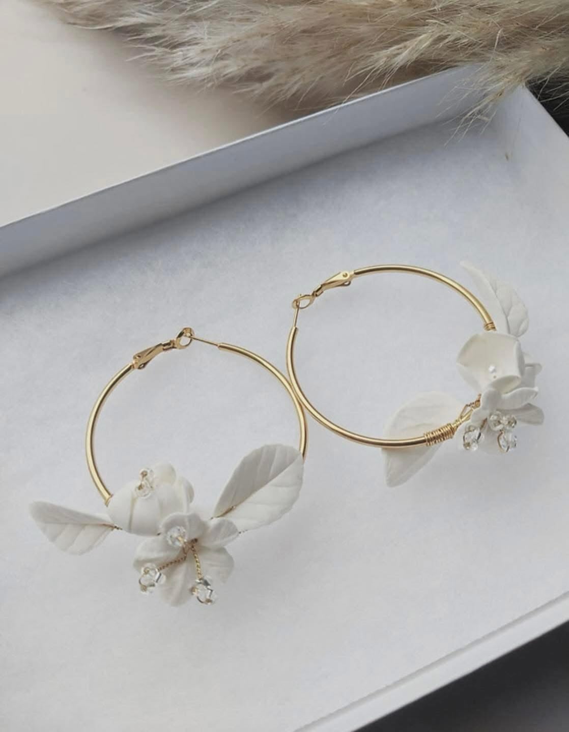 Statement earrings can be a beautiful choice on your wedding day. They add personality, drama and a memorable finishing touch!
A statement earring works best with a simple or clean dress, if your gown is minimalist bold earrings create balance and interest.
All of these are available to view and order in the boutique.
#earrings #bridalearrings #statementearrings #bridal #yateley
