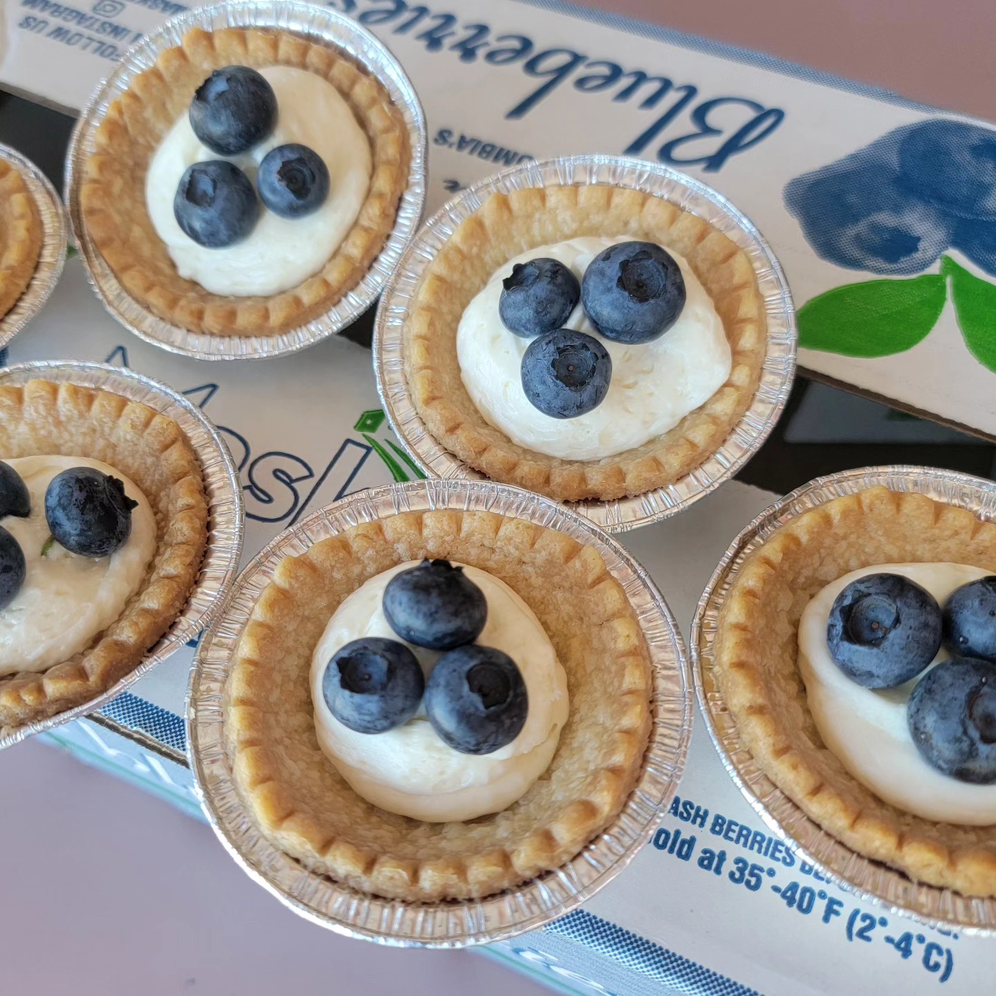 Fresh from our farm to your table! Indulge in our homemade blueberry tarts, made with the sweetest blueberries you'll find. Taste the love in every bite! Come grab your box of blueberries today.
.
.
.
#BlueberryFarm #FreshBerries #HomemadeGoodness #BlueberryFarm #FreshBerries #BlueberryTarts #FarmToTable #HomemadeGoodness #BerryDelicious #FreshFromTheFarm #SummerTreats #BerrySeason #BakingWithBerries #SweetTreats #FarmFresh #LocalHarvest #BlueberryLove #HomeBaked #DeliciousDesserts #BerryGood #EatLocal #SupportLocalFarms #Berrylicious