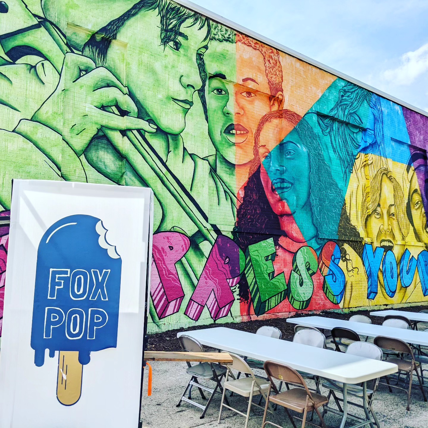 celebrating the mural reveal at Kaleidoscope Academy