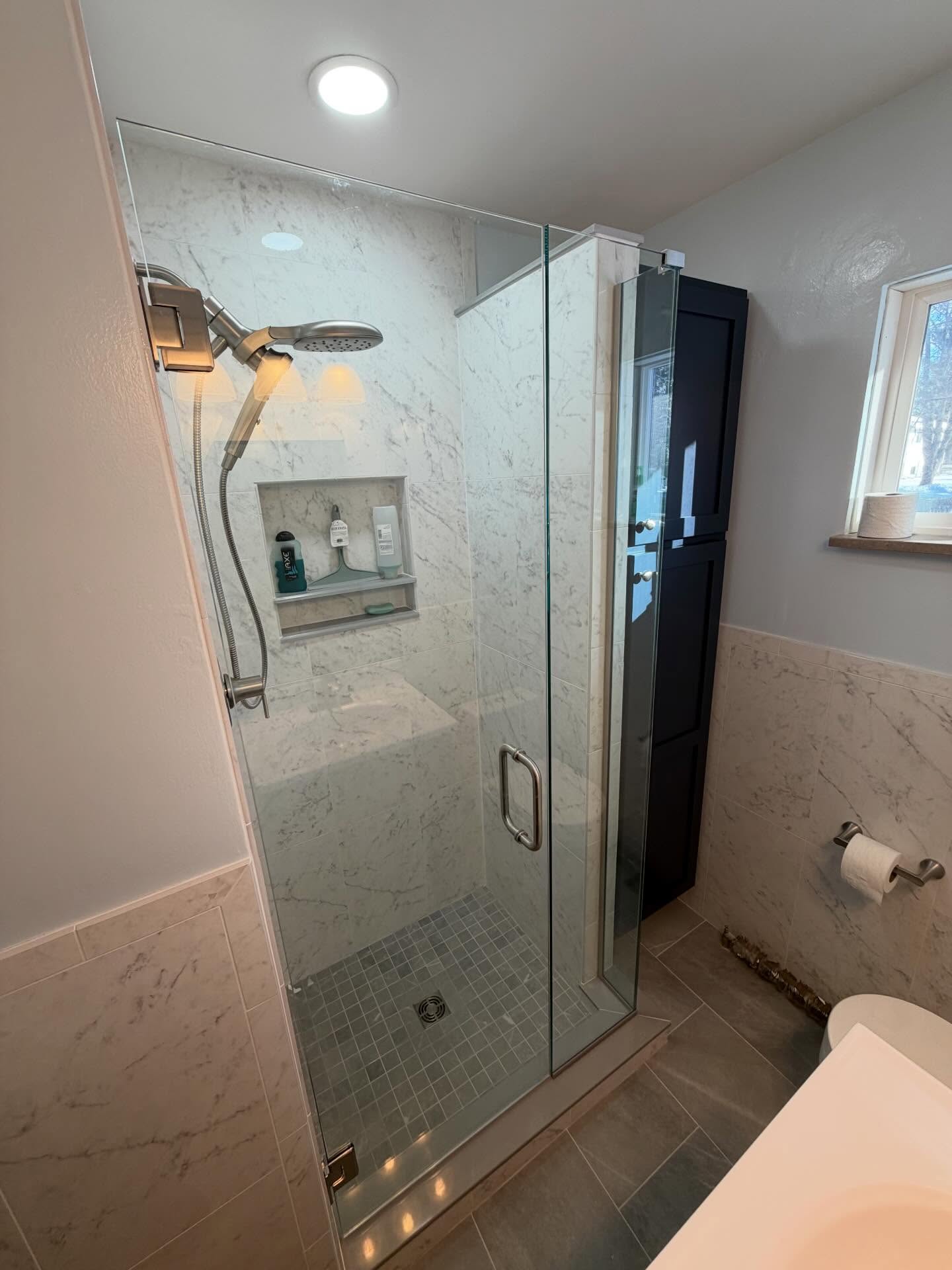 Before & After! I used an after photo for the first one so it’ll show up on our website as a new one. But! These amazing customers of ours got every inch out of their bathroom. The countertop is temporary for now, as their original selection came in broken. Just waiting on that and the heater cover for the baseboard heat, and it’ll be good to go. Get yours today by visiting us online at kimbletile.com
#bathroom #remodel #kimbletile #bathroomremodel #largeformattiles