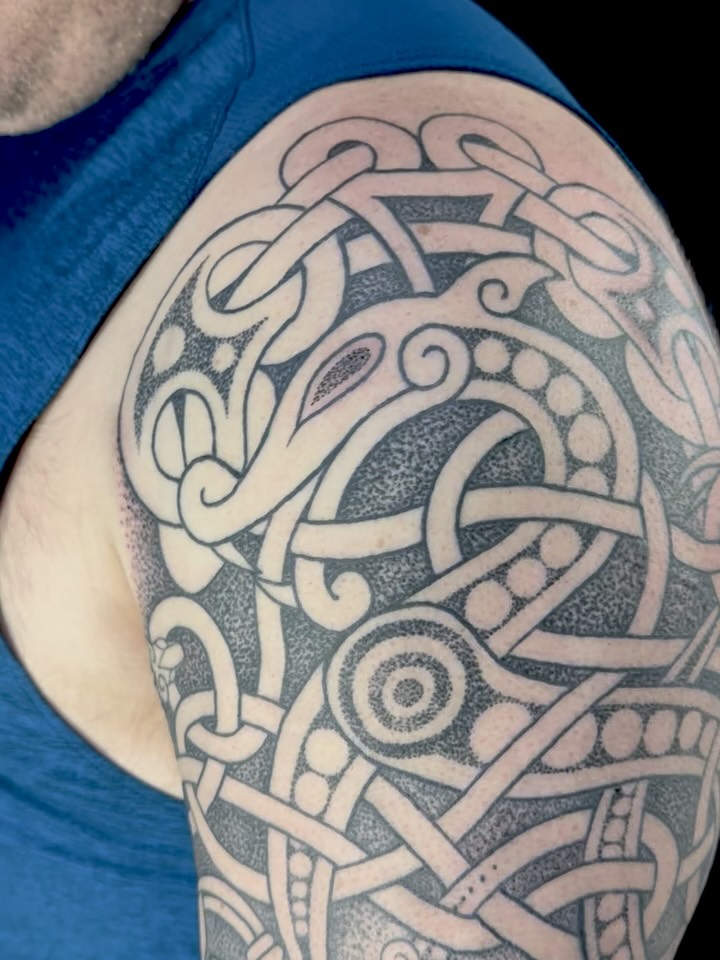 Created this sleeve inspired by my client’s Swedish and Icelandic ancestry. I was inspired by a variety of Icelandic and Swedish archeological finds, to interweave a sleeve that tells the story of my client’s family in their ancestral lands. I left open knots for us to be able to add onto the top of the sleeve, to go into the chest and shoulder areas.
-
-
Thank you to the most lovely client for the best sessions.
-
#triplegoddesstattoos #nordictattoo #dotworktattoo #knotworktattoo #vikingtattoo