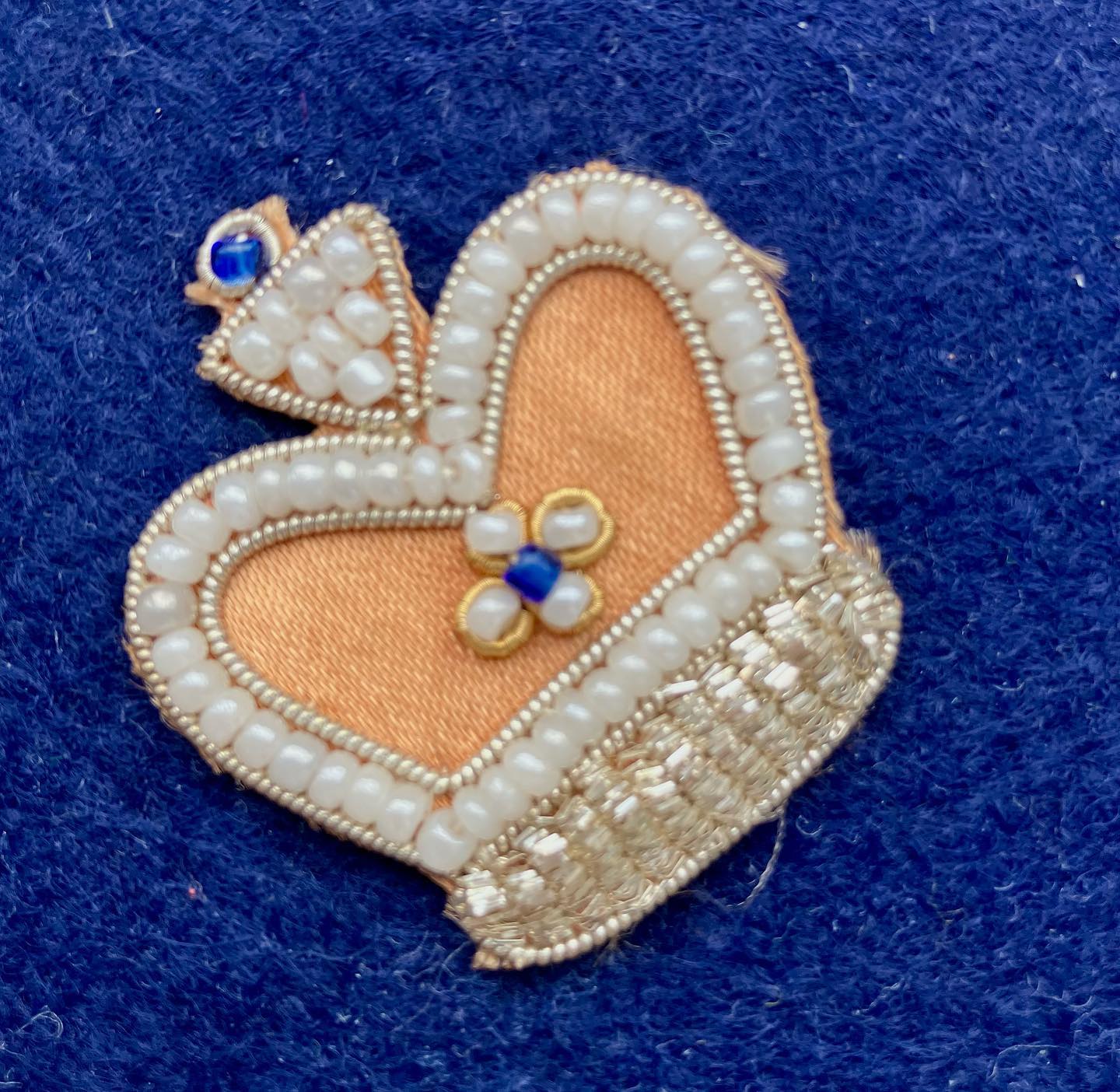 A pretty souvenir from the last coronation - delicate silver threads and pearls on satin #goldwork #metalthreadembroidery #goldworkembroidery #coronation #coronationsouvenir1953