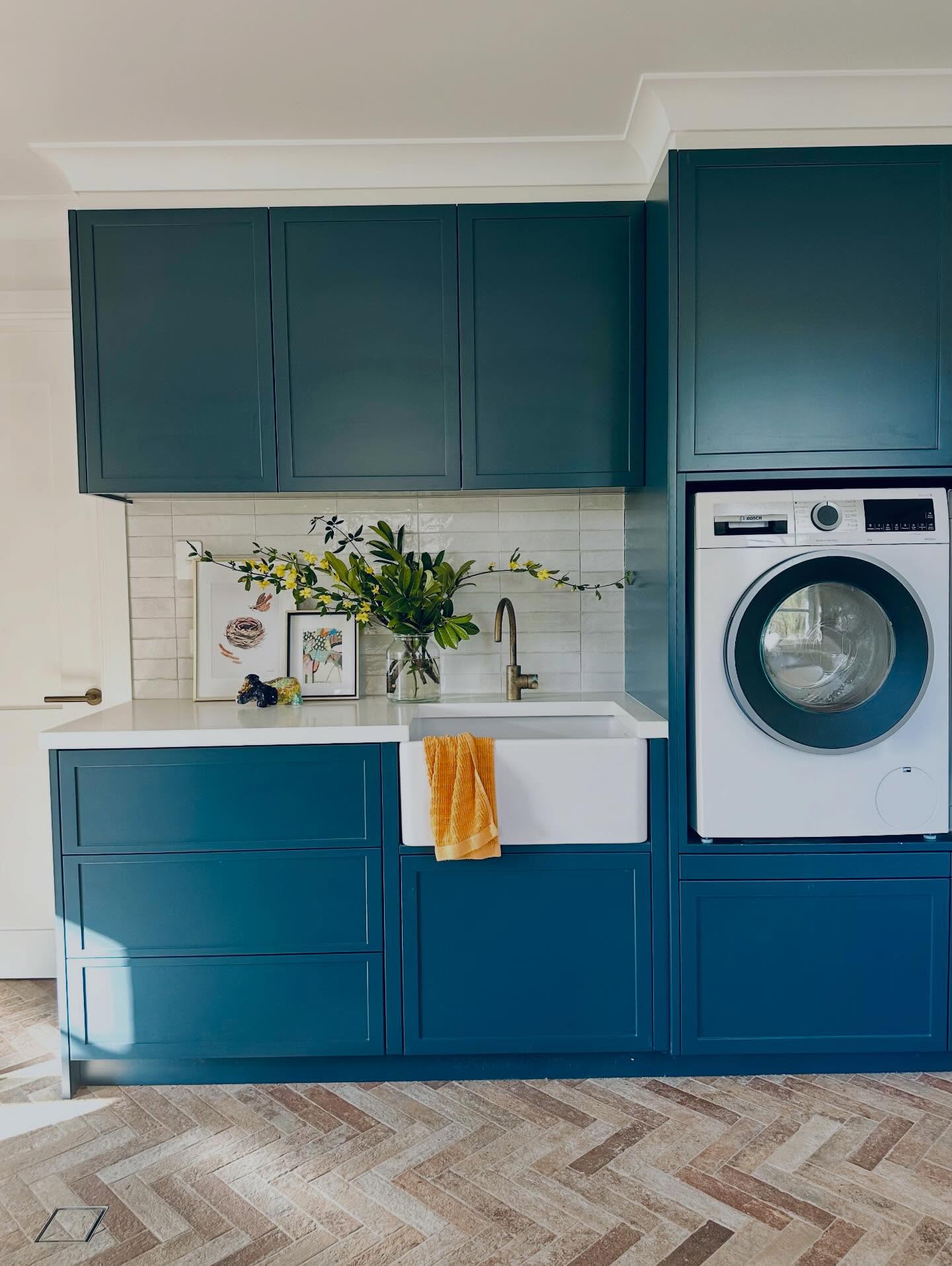 Let’s be honest… laundry is rarely anyone’s favourite pastime. It sits somewhere between “necessary life admin” and “how are there already more towels?”. But thoughtful use of colour can quietly transform a purely practical space into one that you are happy (enough!) to hang out in.
Rich deep navy charcoal tones such as this beautiful laundry in Capital Blue by @duluxaus with feature tiles from @ambertiles can bring a sense of calm and order, making the endless cycle of washing, folding and wondering where the missing socks go feel a little less relentless whilst also giving the laundry a sense of purpose rather than feeling like the forgotten corner of the home.
Because laundries are often compact, they’re the perfect place to be a little braver with colour. Cabinetry, tiles, joinery interiors or even a feature wall can inject personality while still creating cohesion with the rest of the home. It’s a small design move that can make everyday routines feel just a little more enjoyable… or at the very least, far less dull.
Beautiful homes aren’t just about the rooms we entertain in. They’re also about elevating the hardworking spaces that quietly keep life running behind the scenes.
If you have a drab laundry looking for a ‘glow up’ I would love to help - from the design to the colours on the outside (because it needs to function as well as it looks).
#laundrydesignsydney
#laundrydesignsouthernhighlands
#colourininteriors
#laundryinteriordesigninspiration
#laundryroomstyle