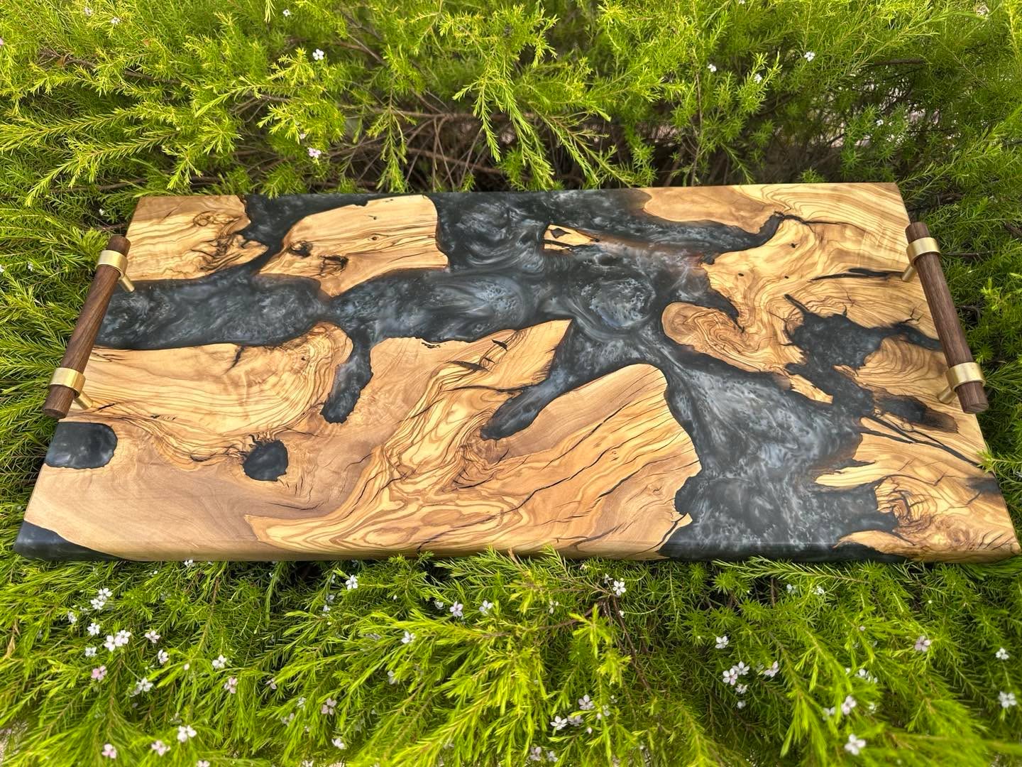 Live edge olive and epoxy resin serving tray.