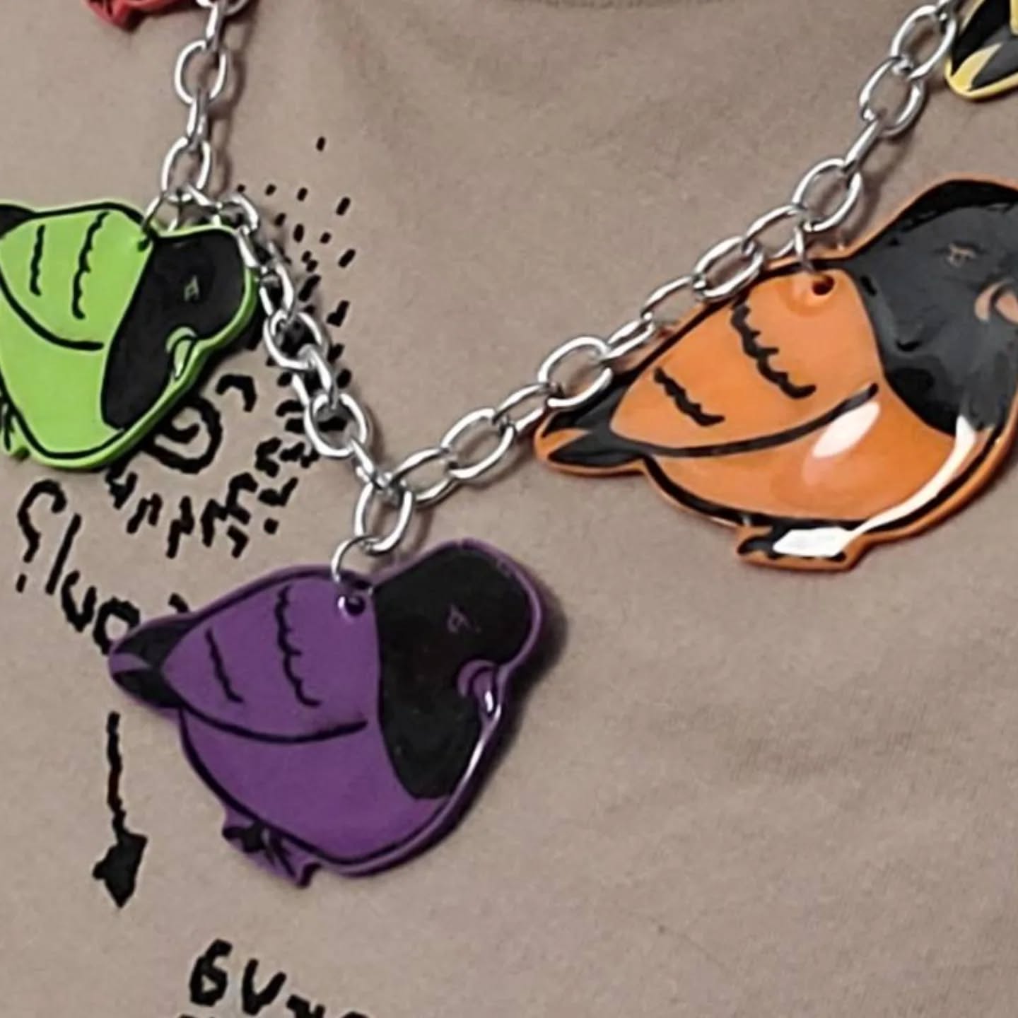 UP NEXT AT InPRINT!
TAG TEAM: Charm Bracelets!
Sunday, February 22, 2026
10am to 12pm
with artist Amye St John
$75 plus tax for paired ticket
TAG TEAM is a series of one-day family-friendly workshops at inPrint, where you create a work of art side by side with your loved ones! Workshop registration is done in pairs for an adult + child (max two total participants per registration).
Get your bestie and have some fun making charm bracelets together the inPrint way!
Using permanent markers and an array of stamps from inPrint's collection, create charms you will add to a bracelet of your own making! We'll print onto shrink film and bake, and then curate our charms onto a piece of jewelry. Each pairing can make two bracelets - perfect for swapping or gift giving or making matching sets!
All materials are included with class fee. Recommended for ages 6 and up. Adults must accompany children. One registration = 1 adult + 1 child.
Register at link in bio www.inprintcollective.com/join-a-workshop
ID: a close-up of multi-coloured shrink film pigeon charms on chain, against a light brown clothe background.