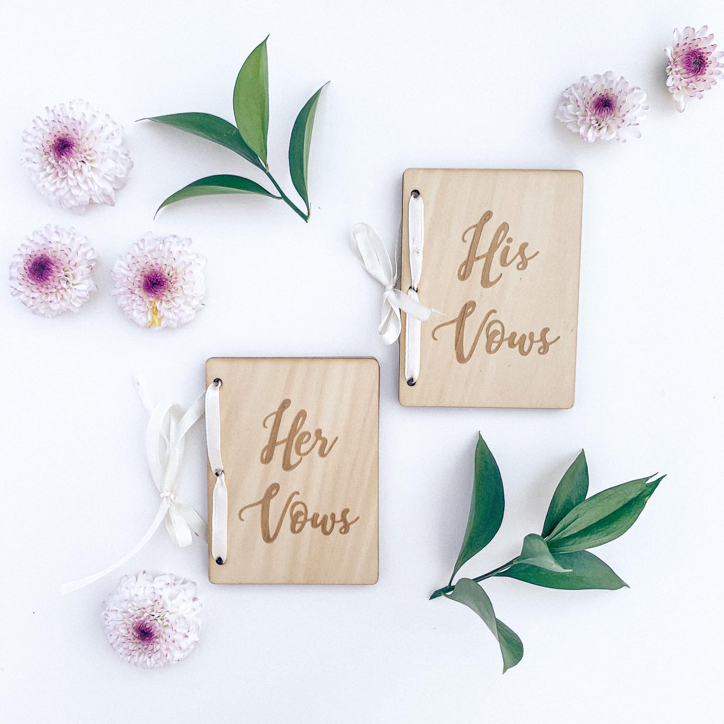 Are you team traditional vows or custom written vows?
The thought of writing your vows can feel overwhelming, but it’s a perfect way to tell your story and give your guests a glimpse into the soul of who you are as a couple.
Sharing your feelings and words in front of all of your family and friends can make for such an intimate ceremony that neither of you will ever forget.
Traditional vows, on the other hand, can take away a lot of pressure on an already nerve-racking day and can also be deep and powerful, especially if faith based.
So we want to know, did you or will you write your own vows?
#flatlay #weddingflatlay