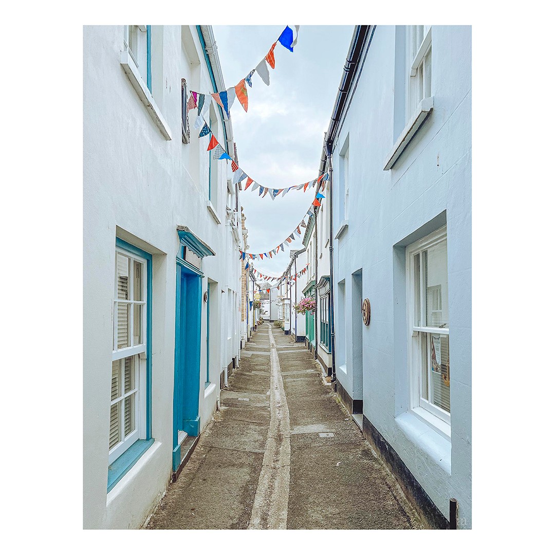 ... #lanes #bunting #devon #cottages #northdevon #seasidetown #photography #britishseaside #overcast #placephotography #senseofplace