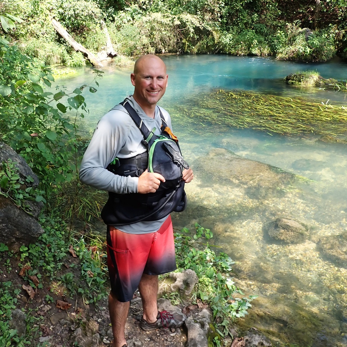 Pictured here is Erik Otto, Earth's Classroom's President of our Board of Directors. Two days ago we could have lost him in a helicopter crash in the Meramec River at Meramec State Park. But we didn't. He and three others unclipped their seatbelts as they were submerged in an upside-down cockpit filled with water, swam to the surface, swam out of a deep hole onto ice, then to shore, and Erik ran hard with one shoe, in deep snow, on a hiking trail, then through the forest to a road, making it to a civilian in a red truck to get help. All of them made it. We are all smiling. Erik's will and leadership is amazing.
Yesterday Bill and I, Jody, visited with Erik and it was SO good to give him a huge hug!
He is pictured at Pulltite Spring on the Current River while he was helping Earth's Classroom as a safety paddler and educator on last year's Paddle MO-Ozarks trip...as he has done every year for MANY with us. Grateful!!