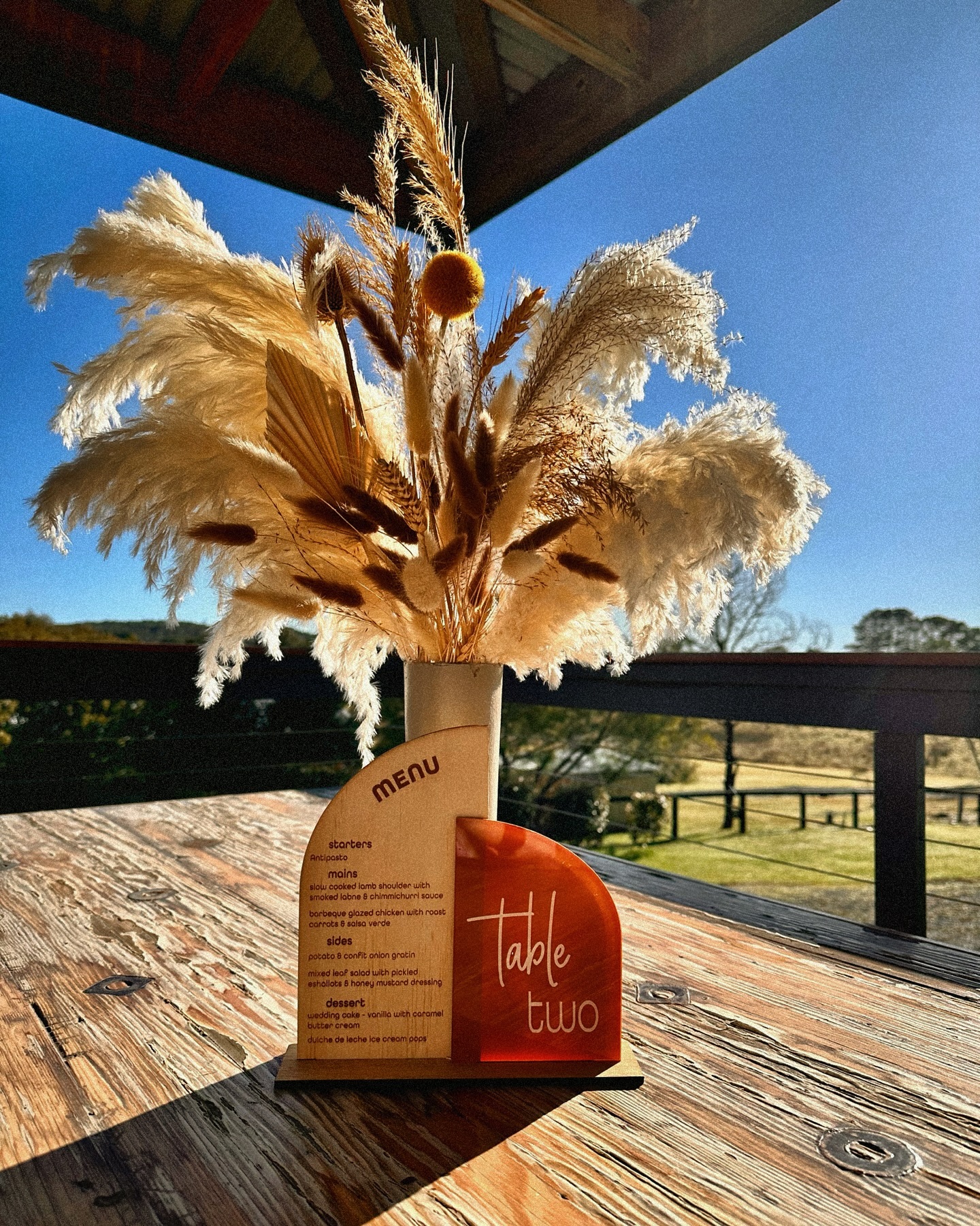 Check out this snippet of our elegant table decor and menus 🌟
Did you know these are available in custom colours, materials, fonts, and bundle packs? We pride ourselves on collaborating with our clients to bring their event visions to life!
We LOVED creating this stunning table piece with the contrast of acrylic and wood, featuring a custom rust paint, for a very special wedding last year…
Imagine your special day with bespoke decor that perfectly matches your theme… how magical would that be?
Reach out and let’s create something unforgettable together! 💫
#weddingdecor #custommenus #eventstyling #wildlilycelebrationsigns #handmadewithlove #bringingyourvisiontolife #dreamweddings #customsignage #bespokesigns