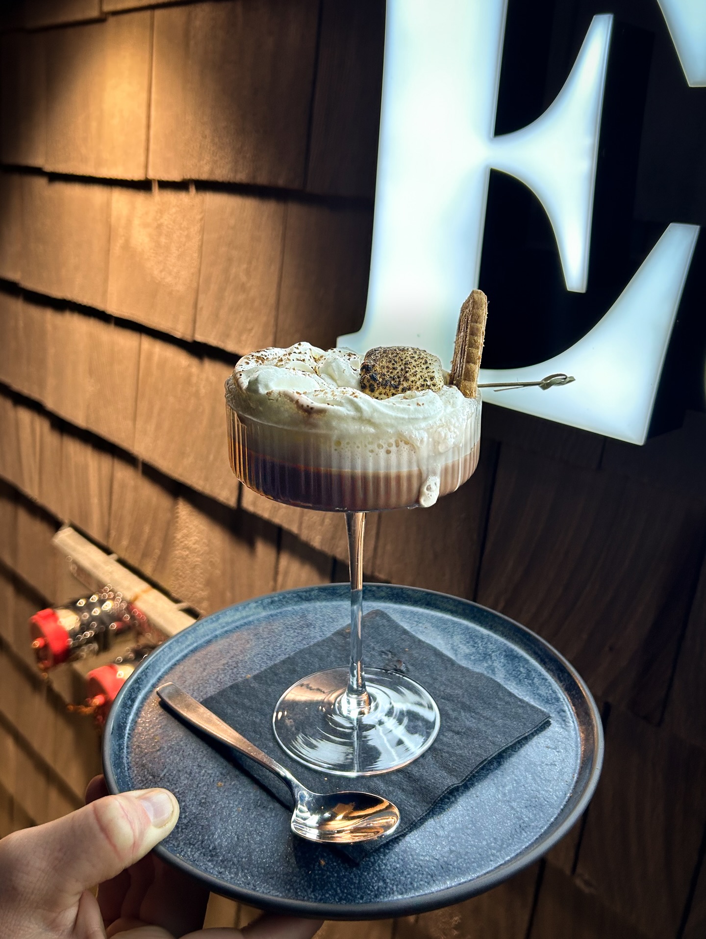 Well, you kept asking: is House of Lager entering the 6th annual Squamish hot chocolate festival????
OF COURSE WE ARE
We present to you, the House of Lager butterbeer hot chocolate.
Think the Simpsons movie when Ned Flanders tempts Bart with that warm ‘cup of cocoa’.
House-made chocolate syrup, steamed milk, whipped butterscotch cream, lotus biscoff cookie, burnt marshmallow, chocolate sprinkles.
It’s rich, cozy, it’s a hug in a mug, sorry.. it’s a hug in a coupe.
Come down to the brewery and get your hands on it, from now until the 25th of February!