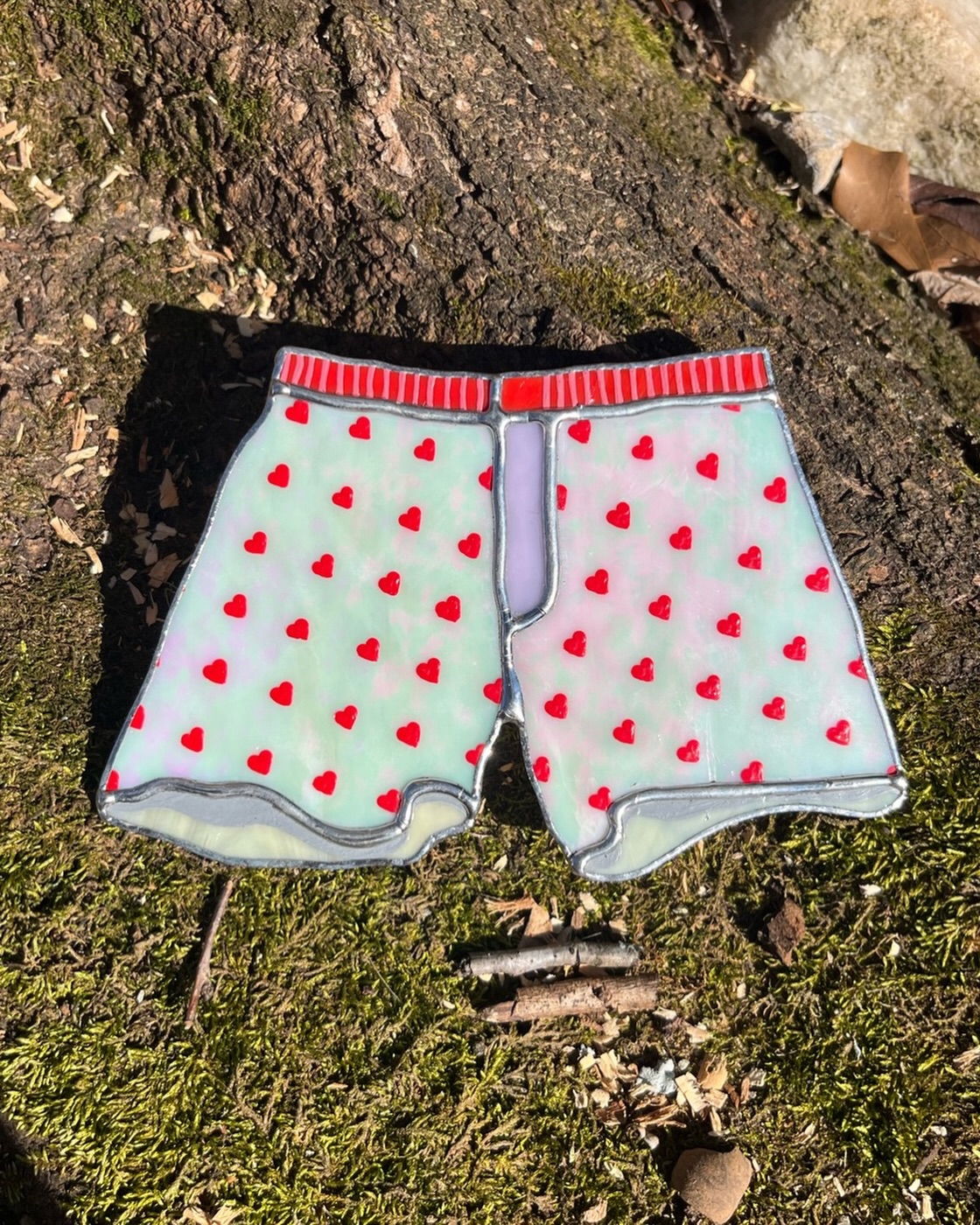 Prepping for @yallmartsc this week with some new Valentines designs! This is one of my faves we did from last year - featuring the gorgeous lavender glass and all of these hand-painted hearts. ā„ļø Itās so funny how some things end up speaking to folks in a different way than you anticipated⦠we ended up getting several comments about this piece and ādungeon crawler Carlā - which, tbh Iām still unfamiliar with, but I guess he wears these boxers? This is classic romance in my eyes!