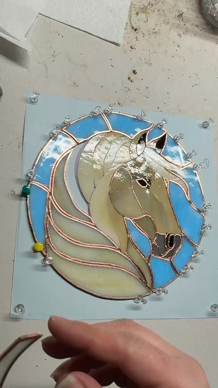 “Halia” is finally finished. This is a memorial piece done for my friend whose beloved horse crossed the rainbow bridge. She’s eating green grass and sleeping in warm straw now with those who passed before her.
#memorial #horse #petportrait #stainedglass #peaceful #love #sidequestcurios