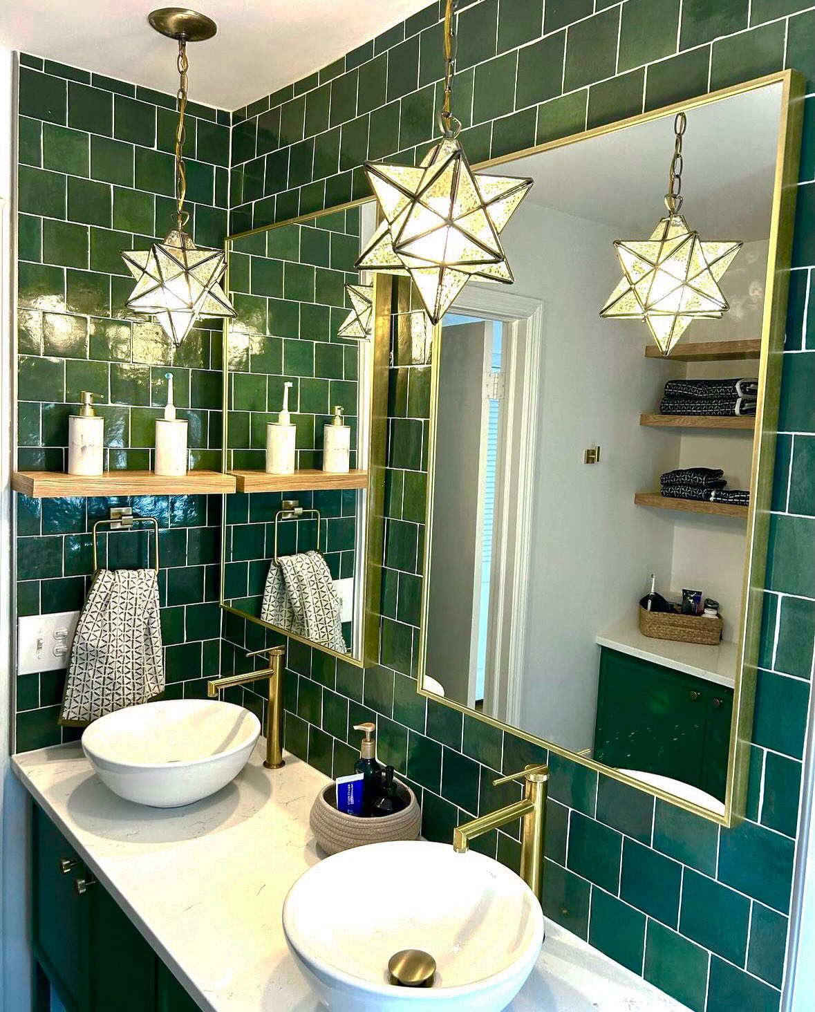 This small primary bathroom got upgraded in a big way, both in function and style. Don’t underestimate what bold tile choices and specialty lighting fixtures can do for an otherwise simple bathroom layout. Super fun!