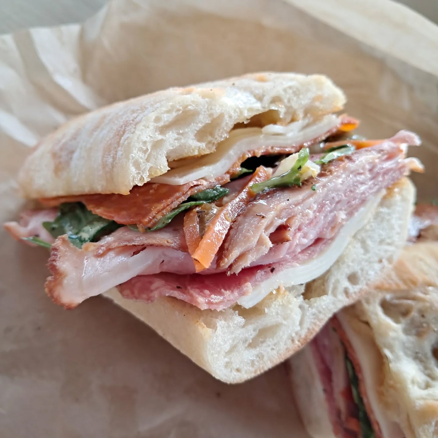 A Faturday Omaha visit to @jgoratsdeli J. Gorat's Deli and Market. The sandwich faithful were out in force today to match meat with bread.
We had the Grinder with its spicy stack of meats, giardiniera, and vinegrette to balance the sandwich. We also had the rosemary adorned bread on the Beef and Cheddar which was the special of the day.
The sandwiches were expertly prepared and definitely worth the roughly $10 price tag and I may have used that delicious bread to make sure all of the vinegrette was all in my tummy.
Happy Faturday and remember to Connect With Food!