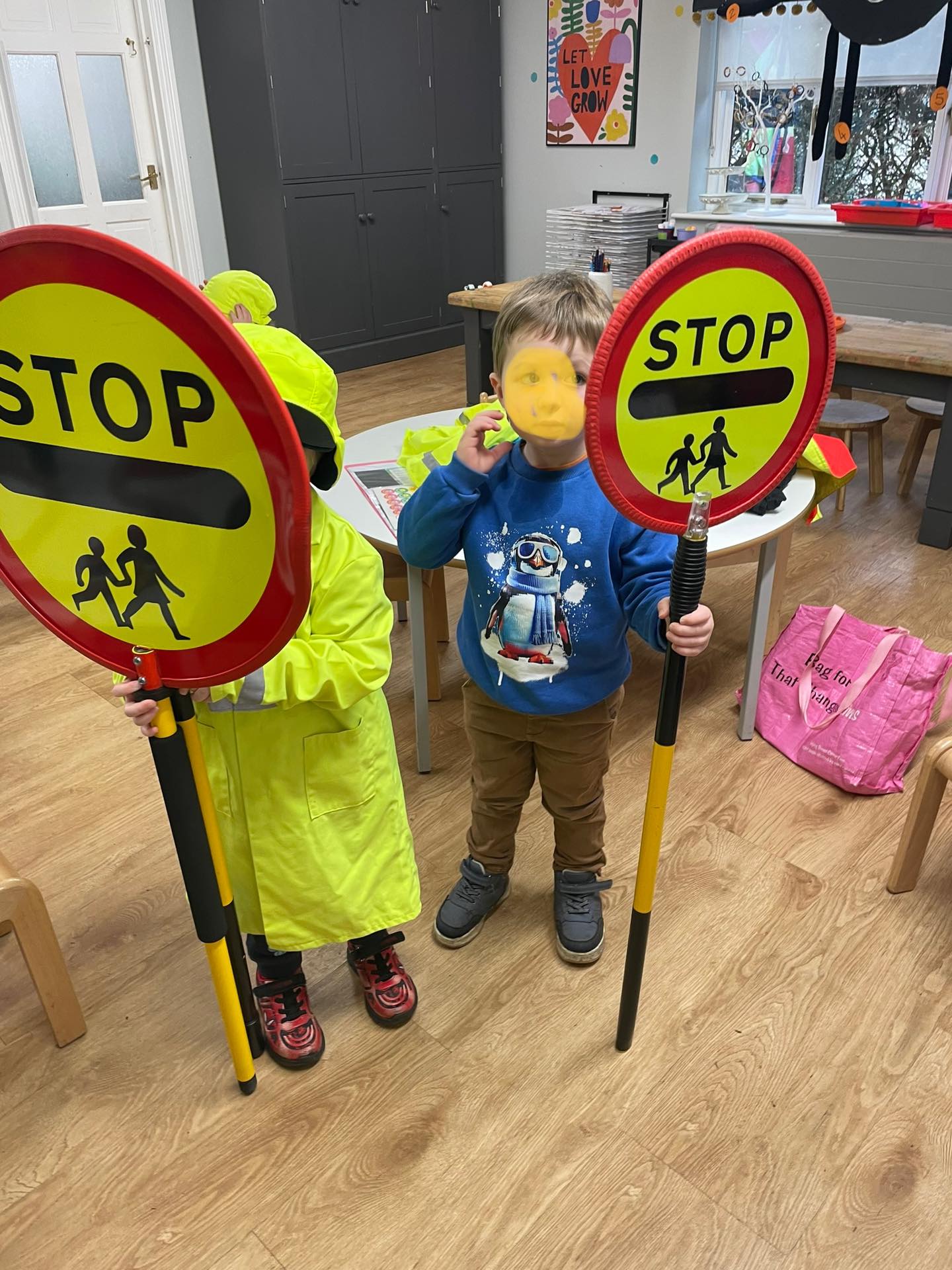 Jackie our village lollipop lady came in to talk to us about road safety. She read us a story and we were able to try on jackets and help her hold the lollipop 🚸 stop look and listen ✋