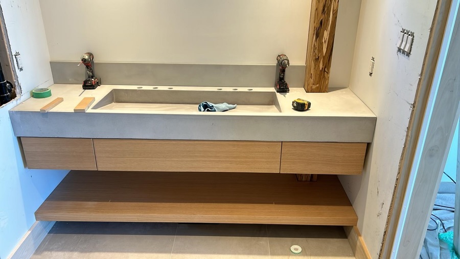 Custom concrete sink backsplashes and millwork vanities, fabricated as fully integrated pieces. Each element was cast to precise dimensions, aligning basin geometry, faucet placement, and backsplash height into a single, seamless composition.
Paired with custom cabinetry, the balance between concrete and wood was carefully refined—clean lines, intentional reveals, and details designed to quietly perform over time.
Nothing off-the-shelf. Nothing accidental. Built to last.
.
#GTACustomHomes
#TorontoHomeBuilders
#CustomHomeToronto
#LuxuryHomeToronto
#TorontoDesignBuild