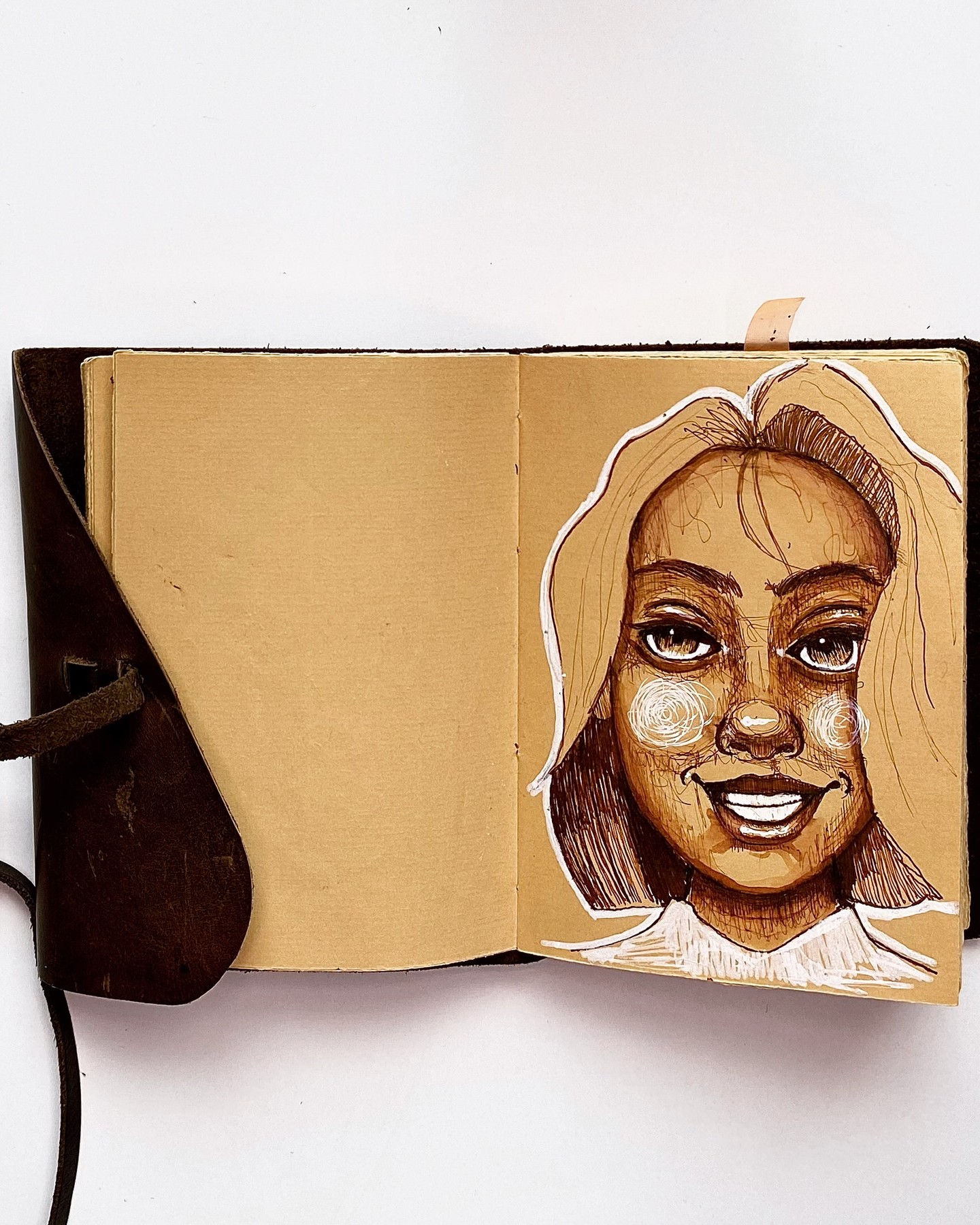 I’m always fascinated by portraits. They story-tell even when they are still. They project their deepest emotions, and we mirror back those emotions. “When I smile, you smile…” The power of art! #sketches #portrait #doodling #journal #handmadejournal #erregattisketchbook #leatherjournal #artist #handcrafted