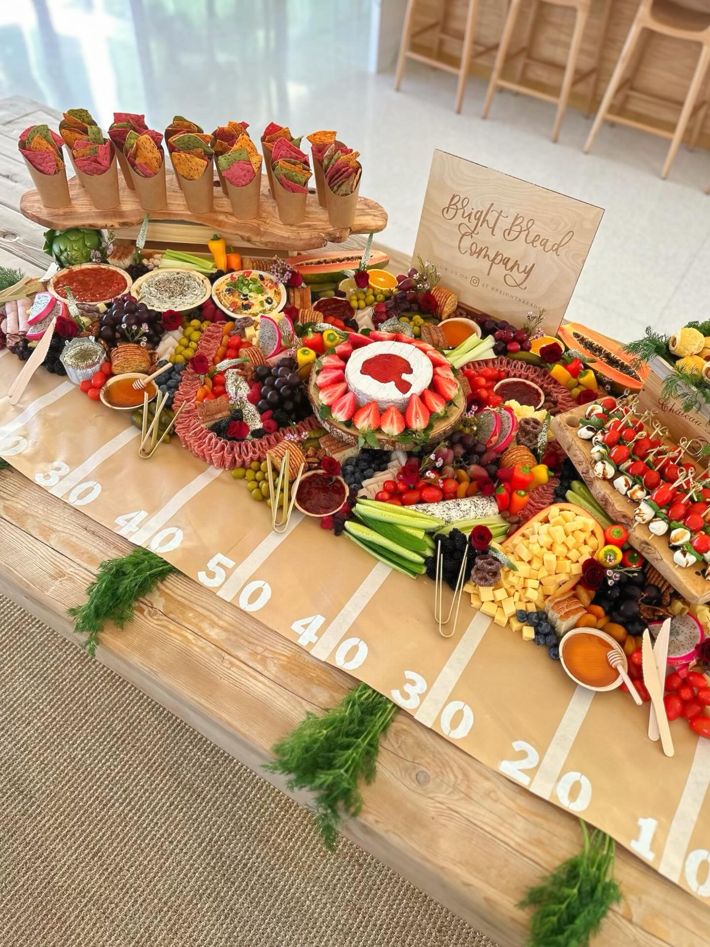 🏈 The Super Bowl is this Sunday, so we’re throwing it back to this Super Bowl–themed grazing table we created for @christinahaack ✨
It’s all in the details ⤵️
• Custom football field kraft paper
• A fully loaded chip & dip station
• Classic pigs in a blanket
• And yes… a football carved right into our brie cheese 🧀🏈
If you’re looking for Super Bowl food inspo, hosting a watch party, or want us to create a custom charcuterie board or grazing table for your event, we’ve got you covered.
📲 DM us at @brightbreadco or
📞 Text (949) 702-2215 to book
#SuperBowlFood #SuperBowlCharcuterie #GrazingTable #CharcuterieBoard #GameDayFood