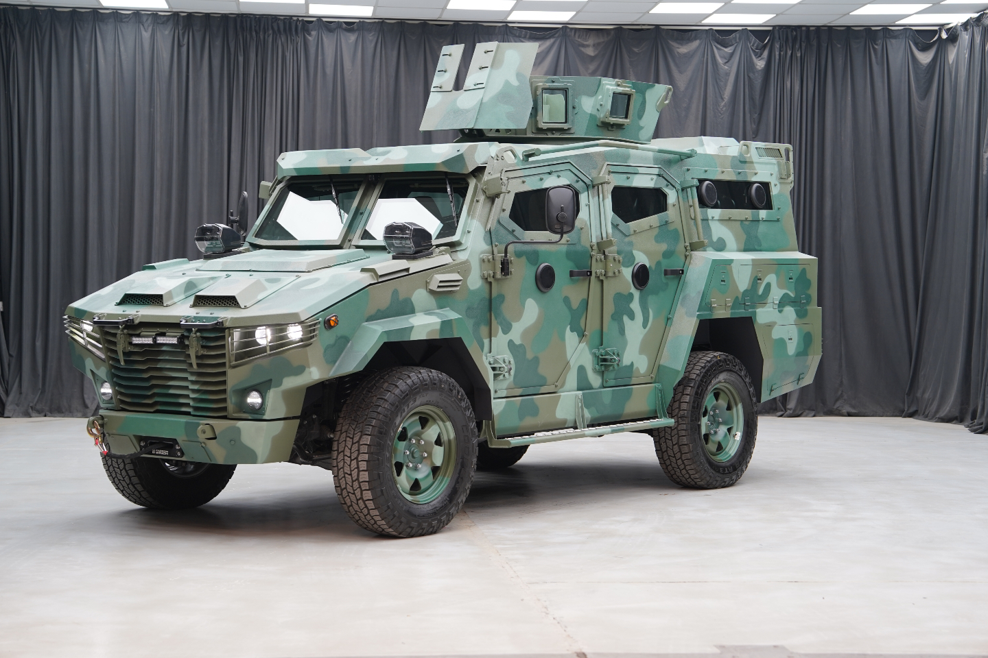 The Robur LT-300 is more than an armored vehicle. It is designed to provide protection, performance, and confidence in high-risk environments.
It combines reliability with real-world capability. It is available with two proven V6 engines, a 3.3 liter diesel and a 3.5 liter petrol, delivering strong torque and responsive performance across a variety of terrains. The four-wheel drive system, advanced suspension, and ensure predictable handling even under heavy load, while features such as run-flat tires and strengthened brakes help keep the vehicle moving when it matters most.
Inside, the Robur LT-300 is designed for teams. It seats up to 8 occupants with a practical seating layout and provides multiple access points through five armored doors. The interior can also be customized with mission-specific features, including a roof-mounted turret hatch. At the same time, the vehicle maintains the familiar layout of the Toyota dashboard to ensure drivers and teams can operate it safely and intuitively.
Protection is at the heart of the design. The Robur LT-300 offers credible ballistic resistance at CEN B6 level while maintaining mobility and payload capacity. Every structural component is reinforced to ensure safety in real-world scenarios, reflecting a commitment to durability, roadworthiness, and operational confidence.
Whether it is used for patrols, personnel transport, or critical security operations, the Robur LT-300 provides peace of mind and reliable protection. It is a vehicle designed to perform when it matters most, giving teams the confidence to focus on the mission rather than the risk.
For additional details or configuration options, feel free to contact us.
#TAGDynamics #ROBURLT300MK3 #ArmoredVehicles #Protection #Security #HighRiskOperations #ExecutiveProtection