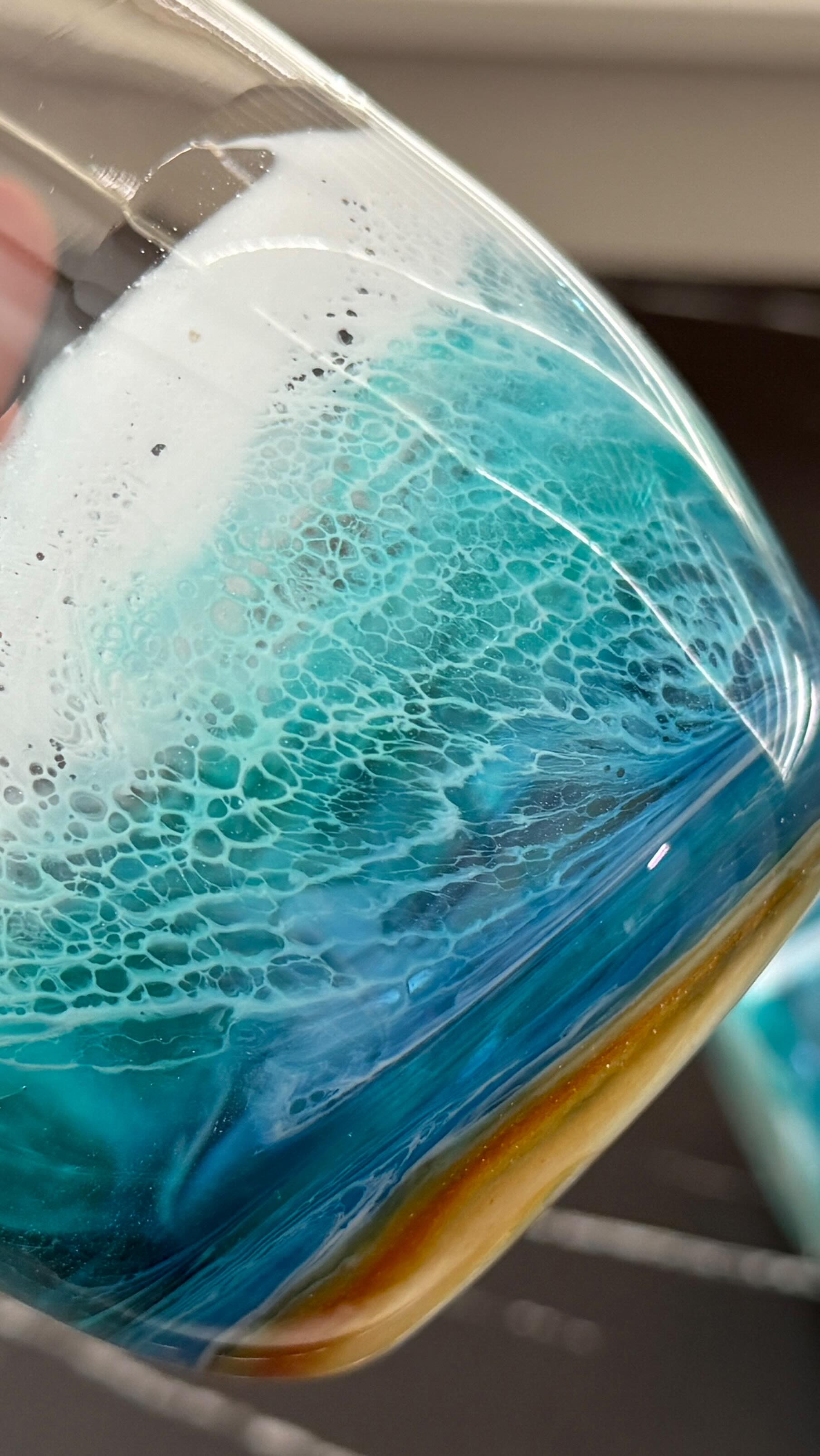 My Flynn Sisters FB page was hacked yesterday and I lost full control of the page 😭 But I GOT IT BACK!!! I’m so thankful Facebook worked so quickly to restore my page! I’ve had that page longer than all my other platforms so I was devastated at the thought of losing it. But anyways…. Here’s a wineglass I did some epoxy beach waves on using my @flynnsisterssupplyshop artist cure epoxy 🌊 We also did this live on my YouTube channel and I will be uploading a full tutorial soon. #resinart #beachwaves