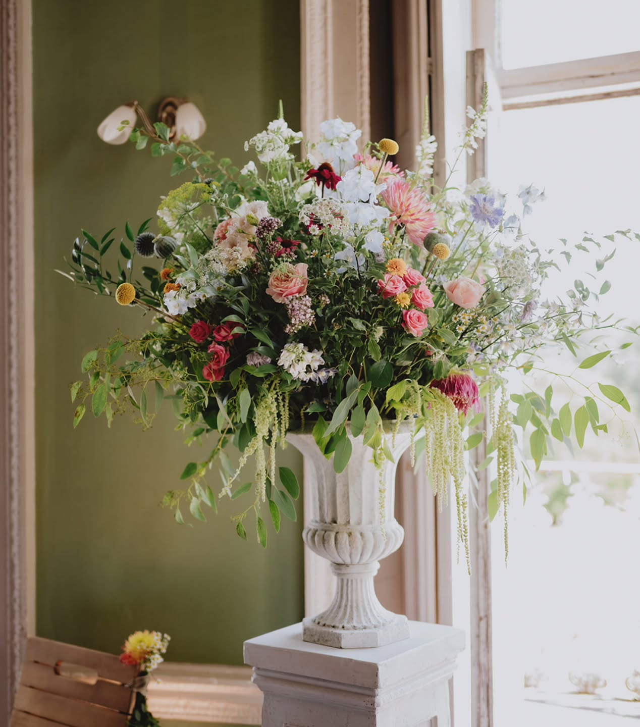 In love with this dreamy picture of one of my ceremony urn arrangements at Lizzie & Gwaine's wedding last summer 🌿
Thank you so much to the talented @photosbyjessrose__ for capturing and beautiful bride @elizabethpillinger for sharing ❤️
Having even a single urn arrangement like this adds softness to your ceremony backdrop and features in all your pictures. It then can be moved to another room or the wedding breakfast to add further interest. Flowers do cost ££ but if you use them well, they elevate the whole look and feel of your event.
After the big day you can take the flowers home or give to guests to enjoy. No floral foam, just water and reusable mechanics that I collect. As it should be!
Photography: @photosbyjessrose__
Venue: @beckenhamplace
Florist: @connieveraflowers
#surreyweddingflowers
#surreyweddingflorist
#carshalton
#carshaltonbeeches