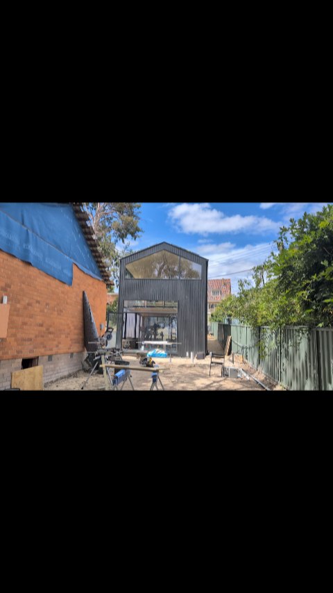 This 2 storey studio is nestled in the back yard of this Torrens residence, it delightfully creates a courtyard with the pool. The materials have been chosen to diminish the external mass, create light play (the dampalon panels light up!). The internal plywood and green tones create a calm space for recreation and work, capturing multiple elegant displays of articulated light and light reflected from the pool.
#architecturecanberra
#secondaryresidence
#backyardstudio