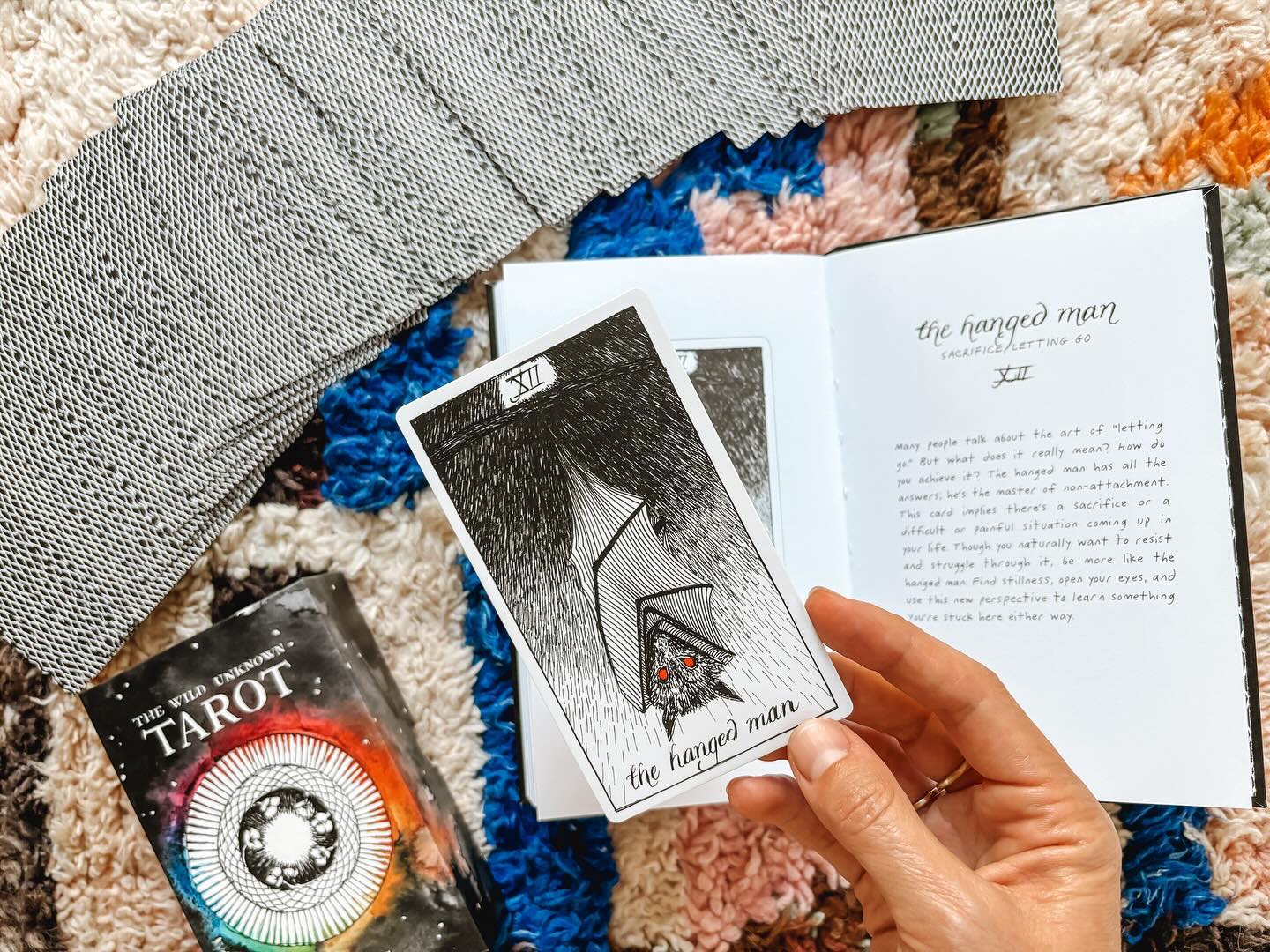 My clients know I like to get a little weird…pulling the thread of archetype, symbolism, imagery and metaphor is one of my favorite ways to get out of the story and into the larger themes, messages and initiations that are showing up for us.
One of the ways we do this is by drawing cards, and it never ceases to amaze (though no longer surprises) me how accurately the cards can tie together a session or offer a new lens through which to see the situation or the Self.
Lately, the cards have been speaking *loudly*. Last week, all three clients I drew with on a particular day pulled *the same card* (not to mention the appearance of that card with another client the week prior), a reminder that we are all parts of the larger collective, the themes weaving through & among us in myriad ways.
I’m sharing this with you now, as it seems there is a larger message for us here in the transition to a new month, a new season.
The card was The Hanged Man, the card of letting go, surrender, sacrifice and renewal. The wisdom of this card reminds us that sometimes, the wisest thing to do is…nothing.
The more we try to control, the more we realize that control is an illusion.
The more the fly in a spider’s web struggles, the more bound it becomes.
What we resist, persists.
BUT…the opposite of control is not chaos, it’s freedom.
In stillness comes clarity.
And also:
*When our hands are open to release, we can also receive.*
The Hanged Man, the archetype of the Bat, reminds us that the darkness initiates spiritual growth, and that much information can be gleaned from viewing our lives from upside down 🦇
Are you feeling this message? Are you at a crossroads? How are you relating to the struggle? Also, I have two new decks to add to my collection arriving tomorrow! What decks do you work with?