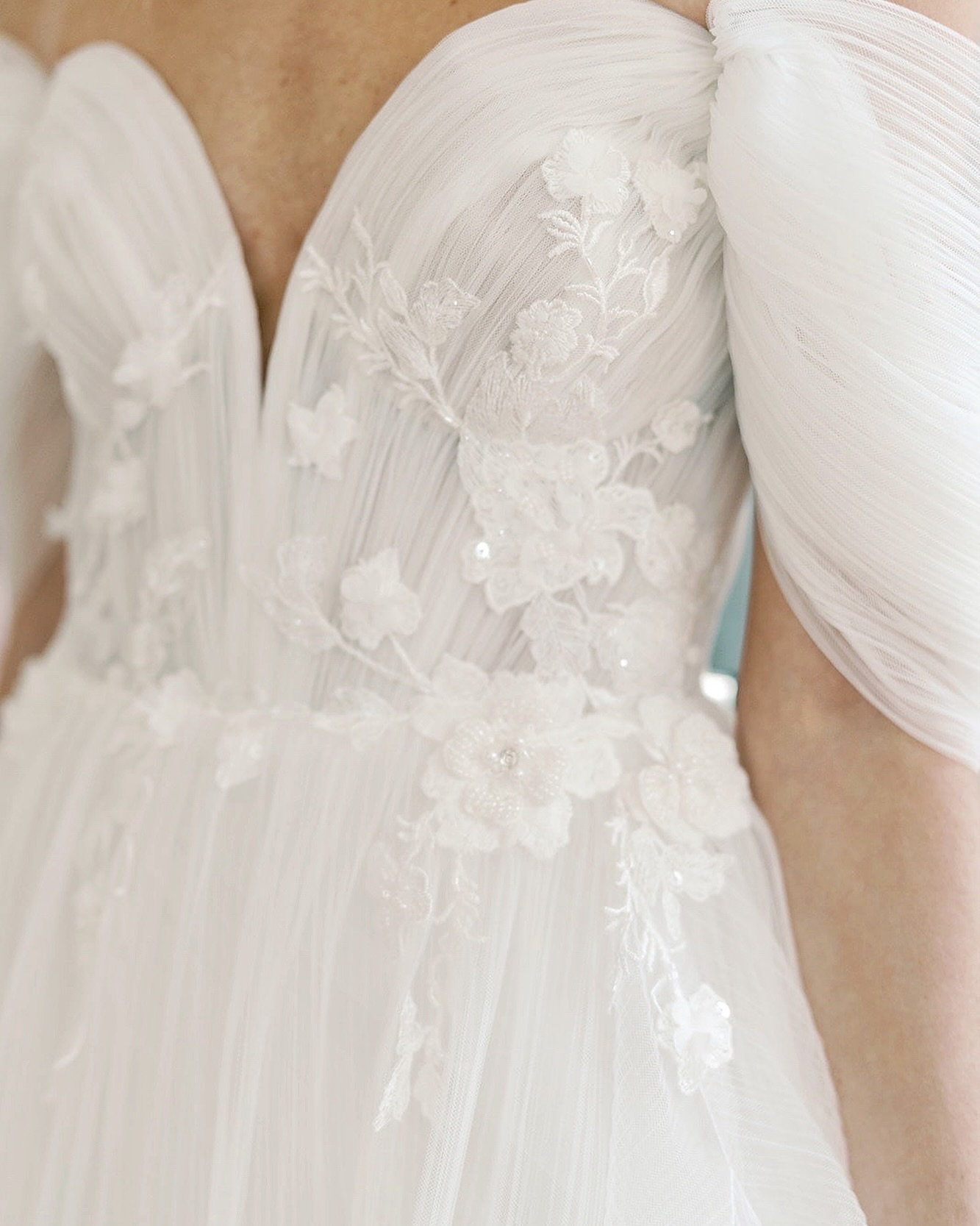 One of our favorite gowns…here’s a close up! Fiercely feminine with layers of pleated tulle and a deep v-neckline featuring unique 3D Floral Appliqués that extend into the skirt. The “Clivia” gown is fearless and angelic. Try this beauty on during your Gigi visit!
.
Book online now at www.gigiblanc.com
.
.
.
.
.
.
.
#gigiblanc #bridal #bridalboutique #wedding #weddingdress #bridalgown #bridalcollection #weddinginspiration #shopsmall #localbusiness #shoplocal #bridalshower #bridaldresses